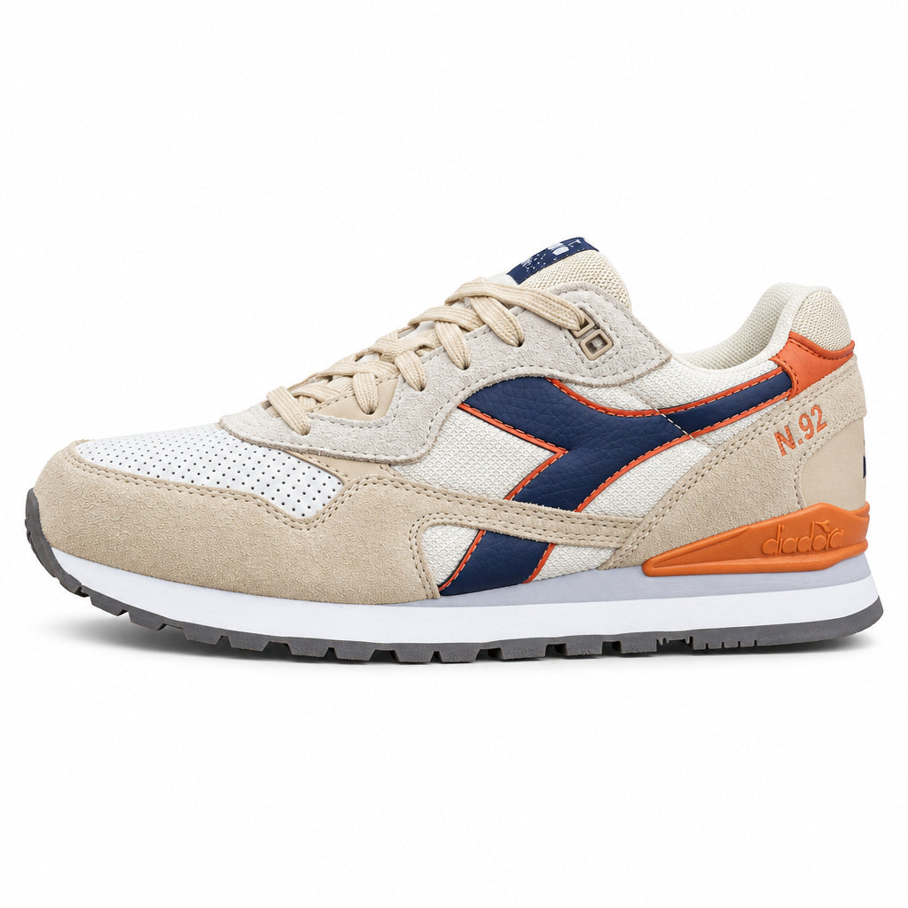 Diadora N.92 Advance One shoes in white, boulder, and pageant blue with stylish design and sporty silhouette.