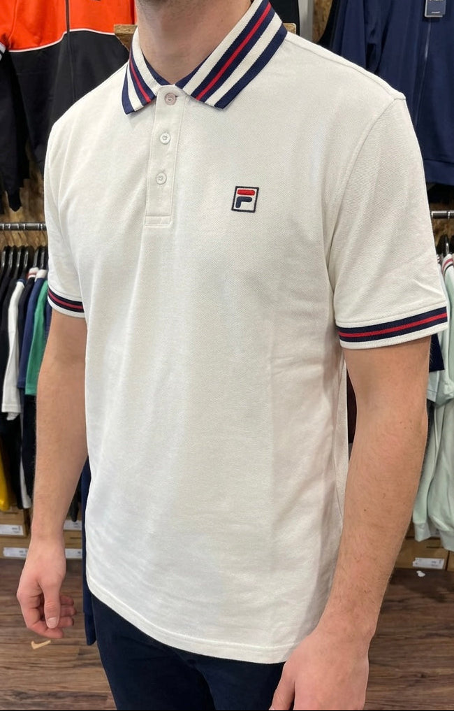 Fila vintage Achille three-button polo shirt with heritage tape detail in gardenia color, featuring a classic collar and short sleeves.