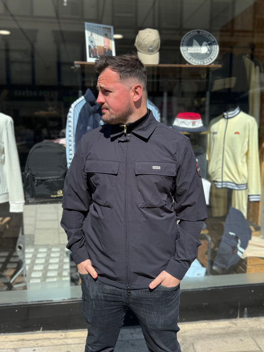 Black Napapijri O-Ridge overshirt jacket displayed on a hanger with a close-up view of the fabric and design details.
