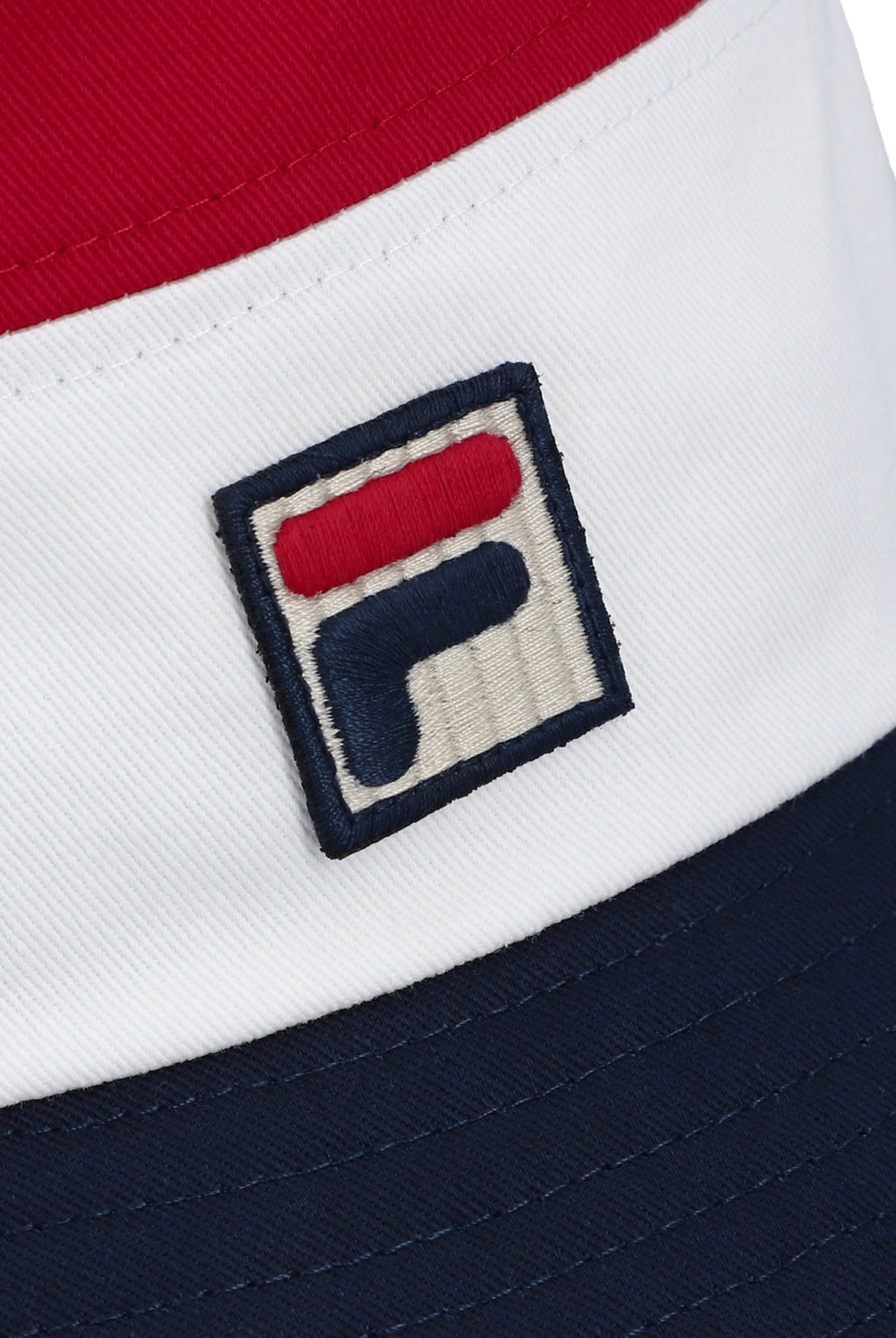 Fila vintage Marco tri-color bucket hat in red, white, and navy with a classic design and branded logo detail.