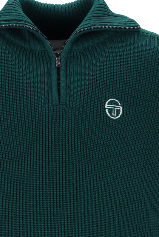 Deep teal and gardenia Sergio Tacchini Toledo quarter zip jumper displayed on a hanger, showcasing its color and fabric texture.