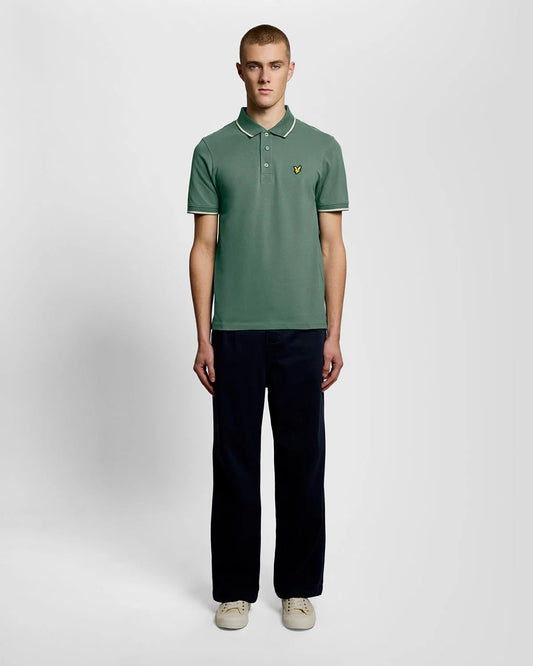 Men's Lyle & Scott tipped polo shirt in Everglade and Wheat, featuring a classic collar and short sleeves.