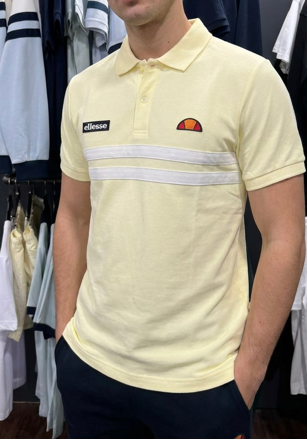 Light yellow Ellesse Muccia polo shirt with classic collar and short sleeves, displayed flat on a white background.