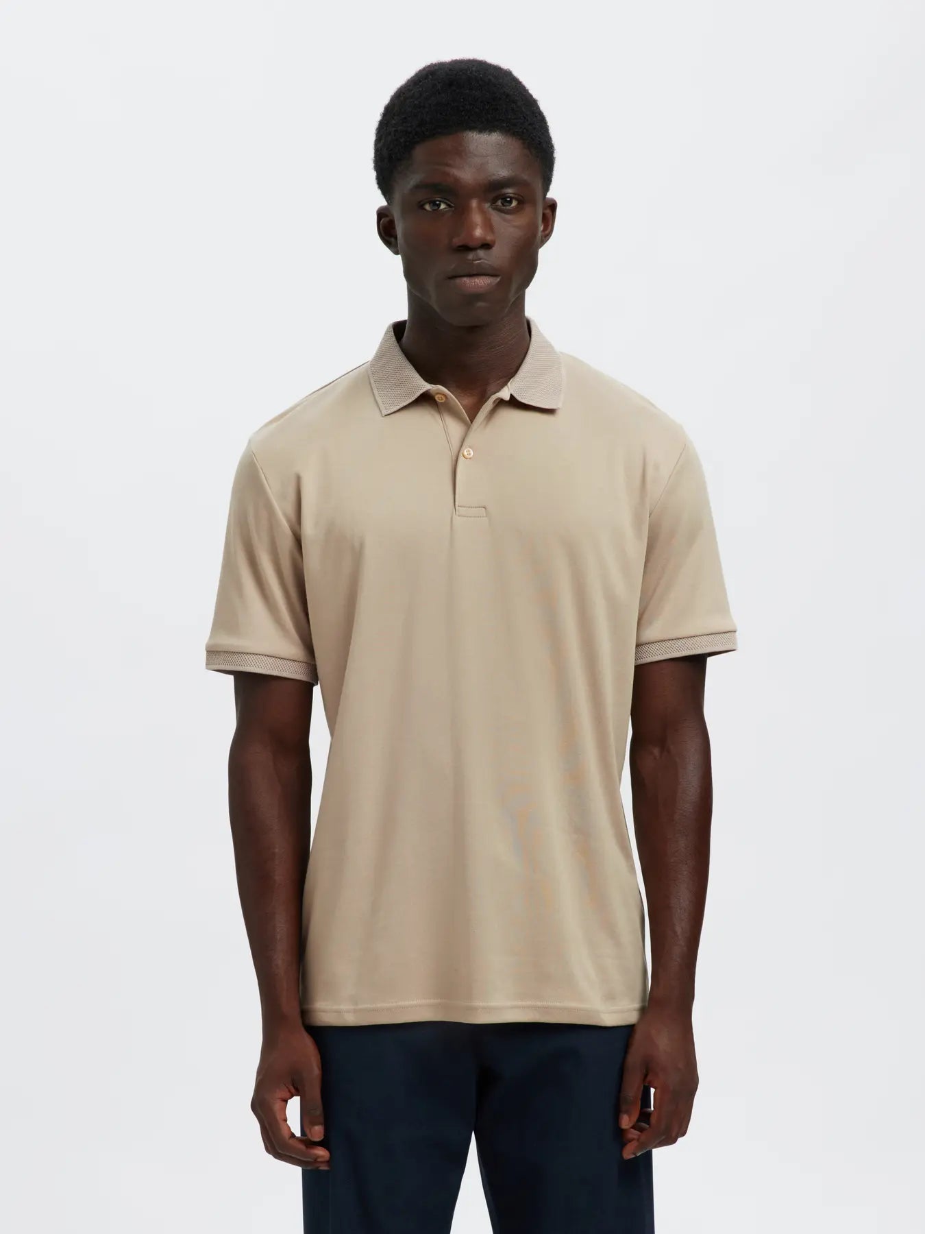 Selected Homme Slmfave Button Polo Shirt in oatmeal, showing front view with collar and button details.
