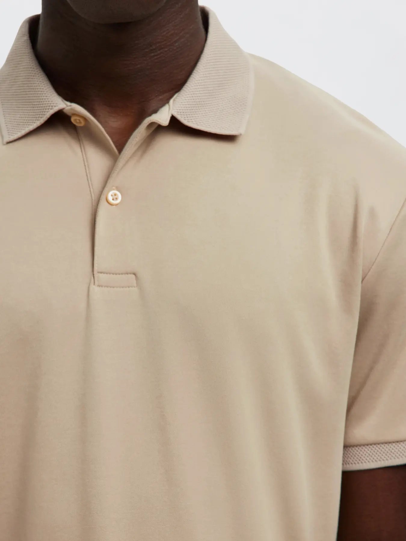 Selected Homme Slmfave Button Polo Shirt in oatmeal color, casual men's polo with collar and button details.