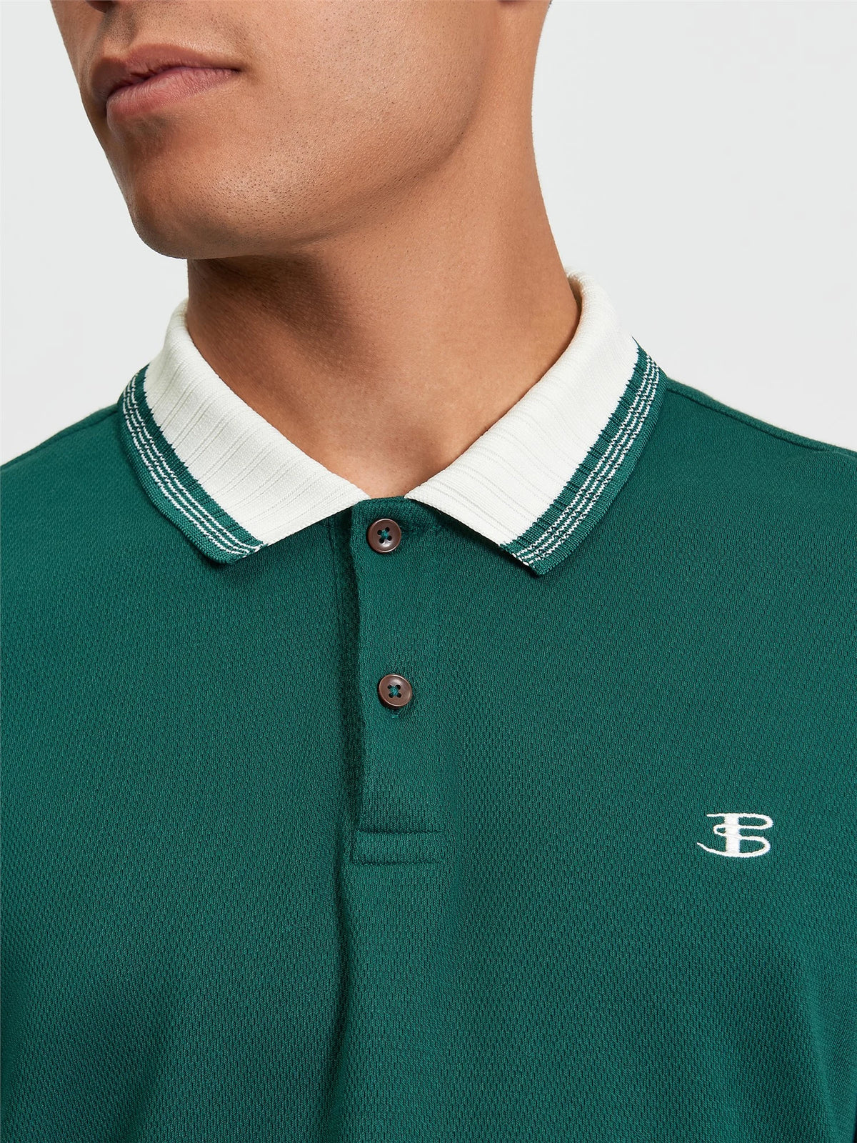 Ben Sherman Trim Block Polo shirt in dark green, featuring a classic collar and subtle branding, displayed flat.
