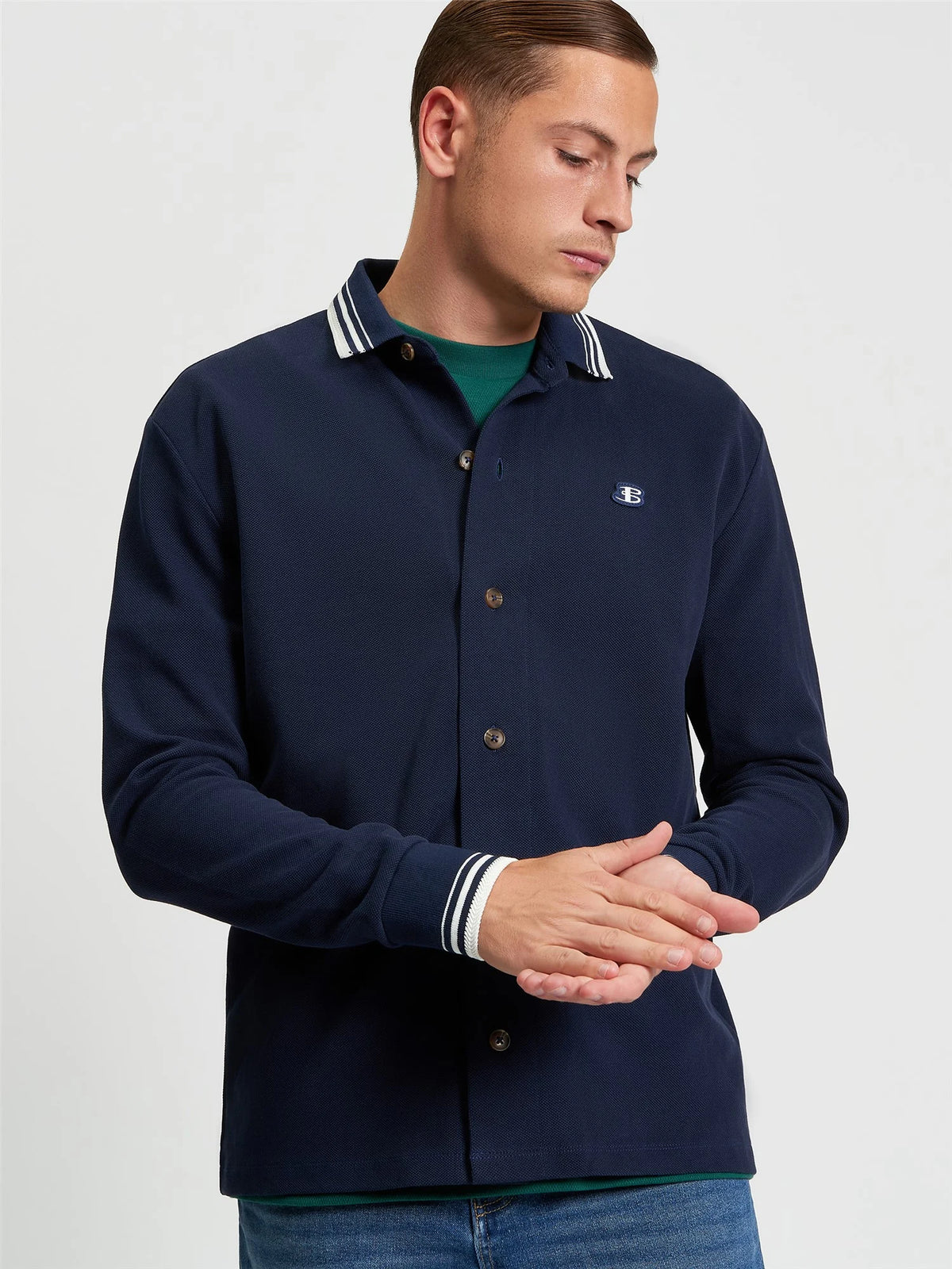 Ben Sherman navy long sleeve polo shirt with tipped collar, made by RD1 Clothing, displayed on a neutral background.