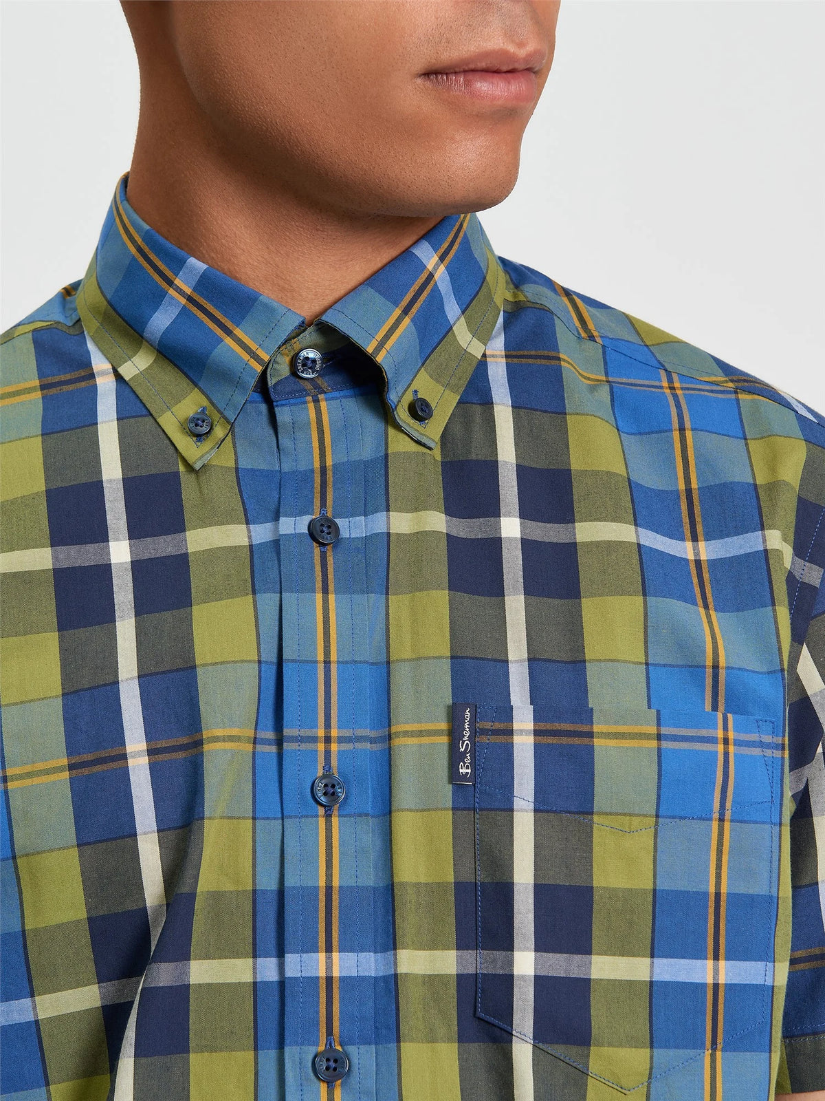 Ben Sherman classic short sleeve check shirt in green, featuring a button-up design and collar, on a plain background.