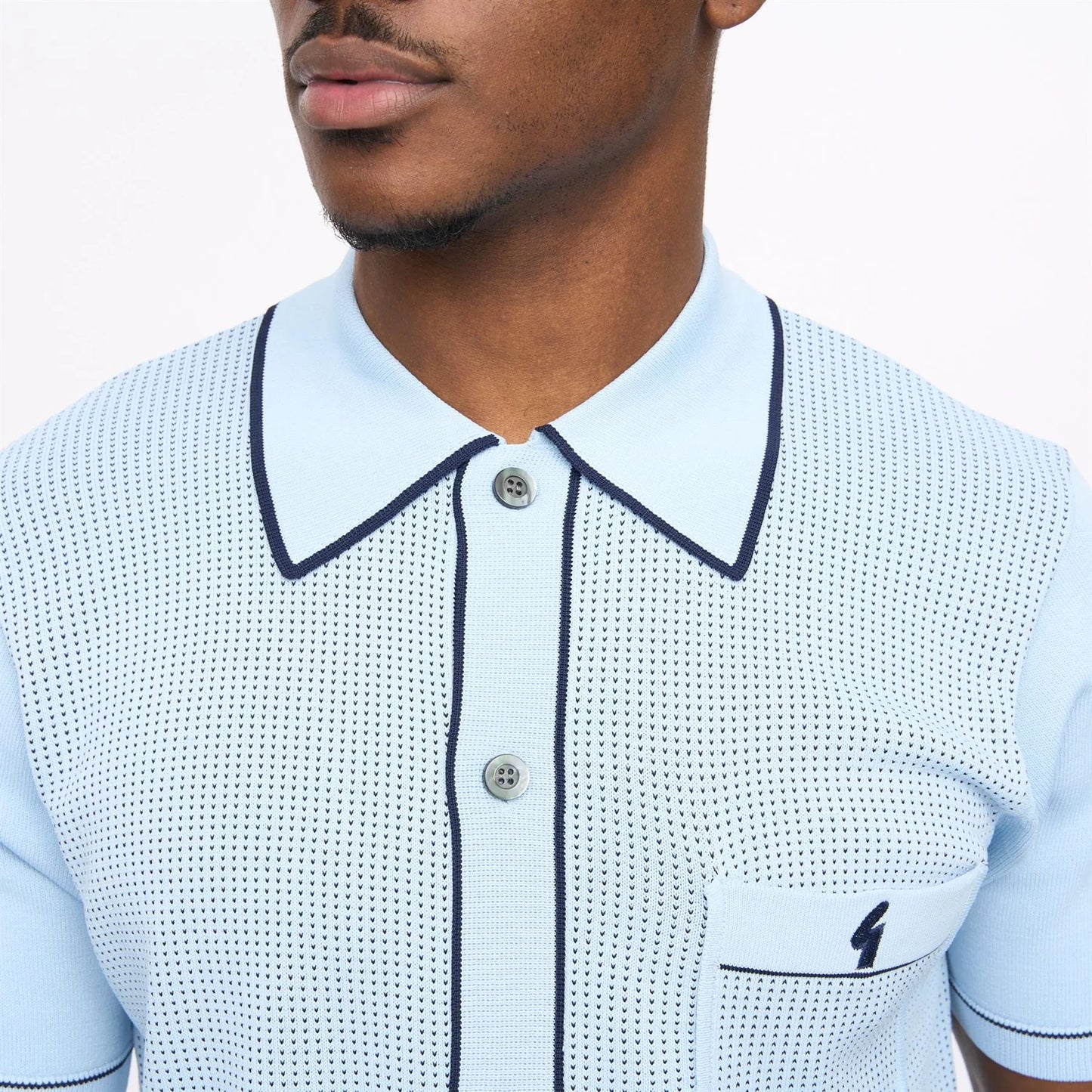 Gabicci Vintage Gabicci Di Lello knitted polo shirt in surf-inspired knitwear with a classic collar and textured pattern.