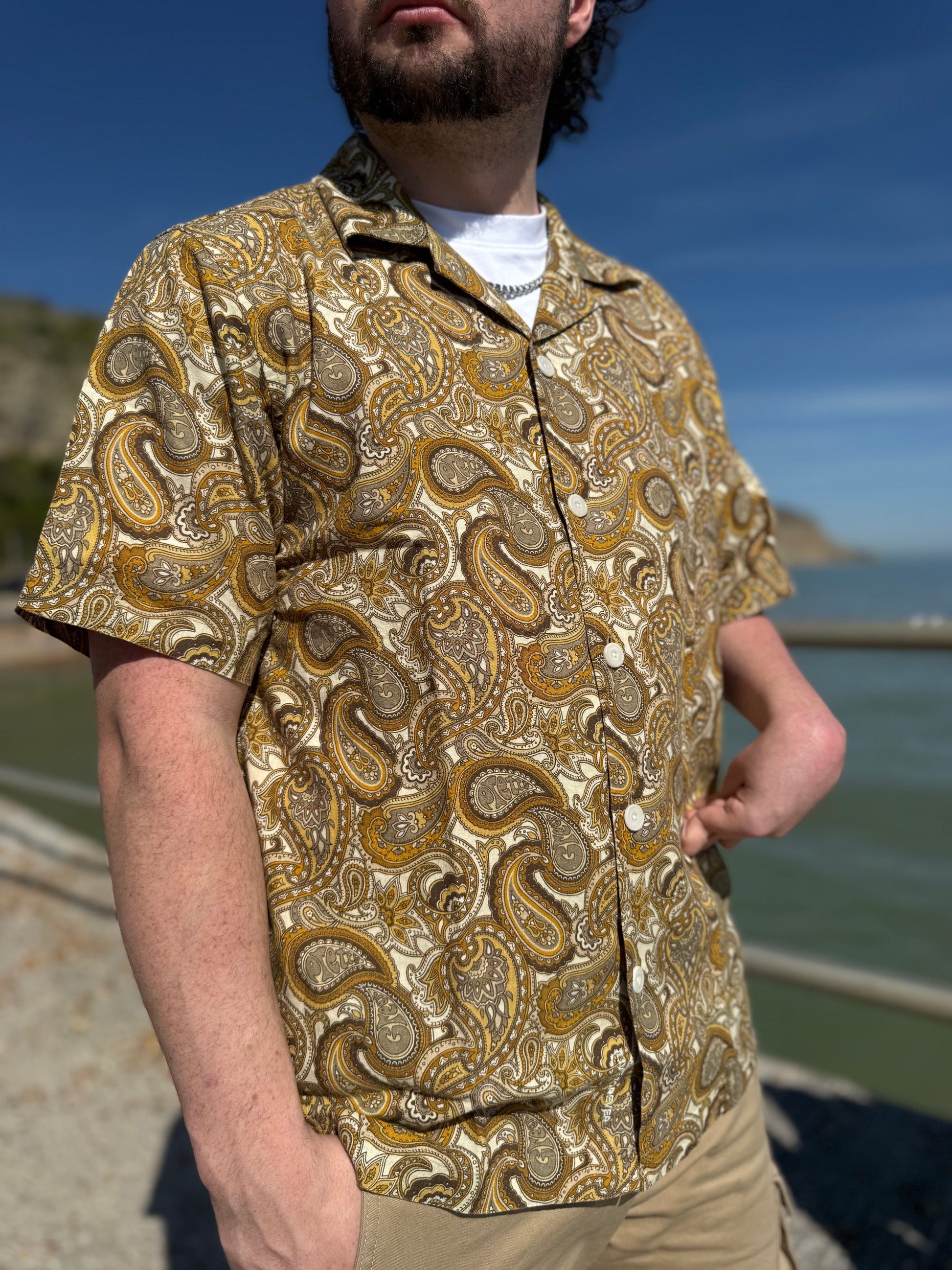 Pretty Green Hermosa Paisley shirt featuring a vibrant paisley pattern and classic collar design.