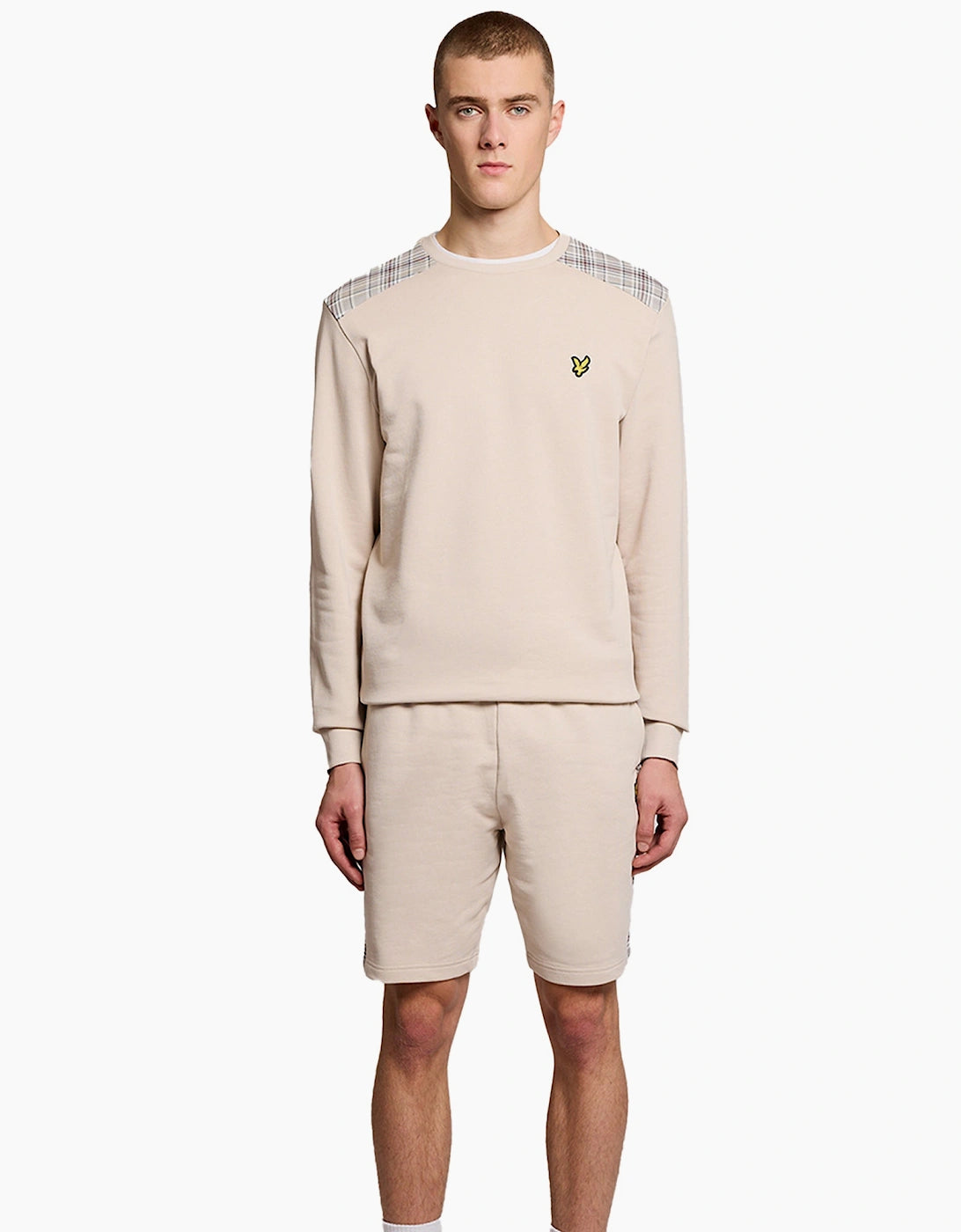Lyle & Scott check panelled crewneck sweatshirt in navy and white with classic branding, displayed on a plain background.