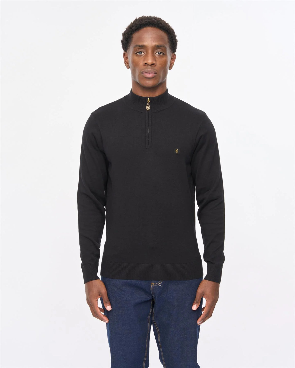 Black Gabicci Vintage Naxton quarter zip jumper, showcasing a close-up view of the stylish collar and textured fabric.