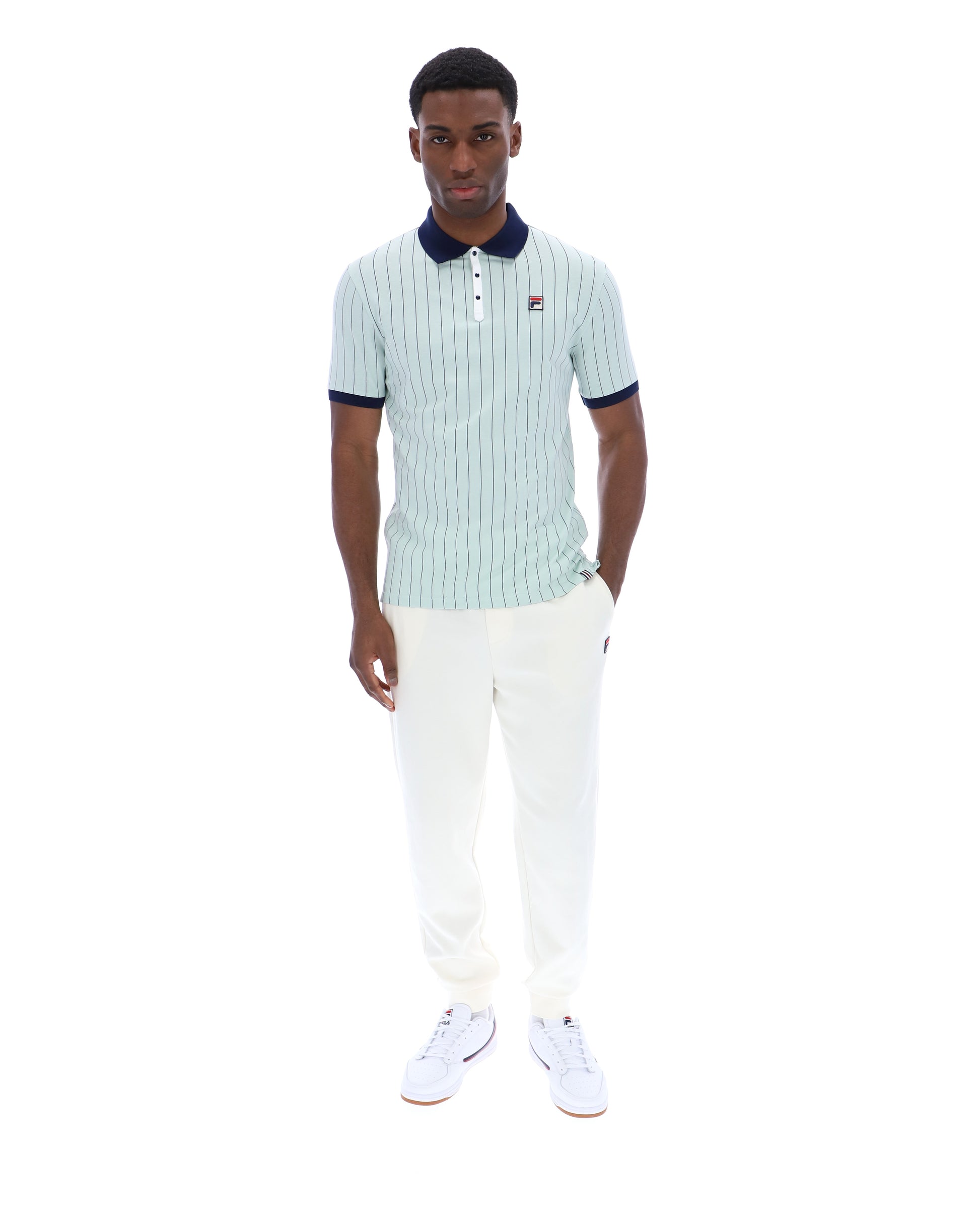 Fila Vintage BB1 Polo Shirt in Surf Spray, Navy, and White, featuring a classic collar and polo design, displayed on a flat lay.