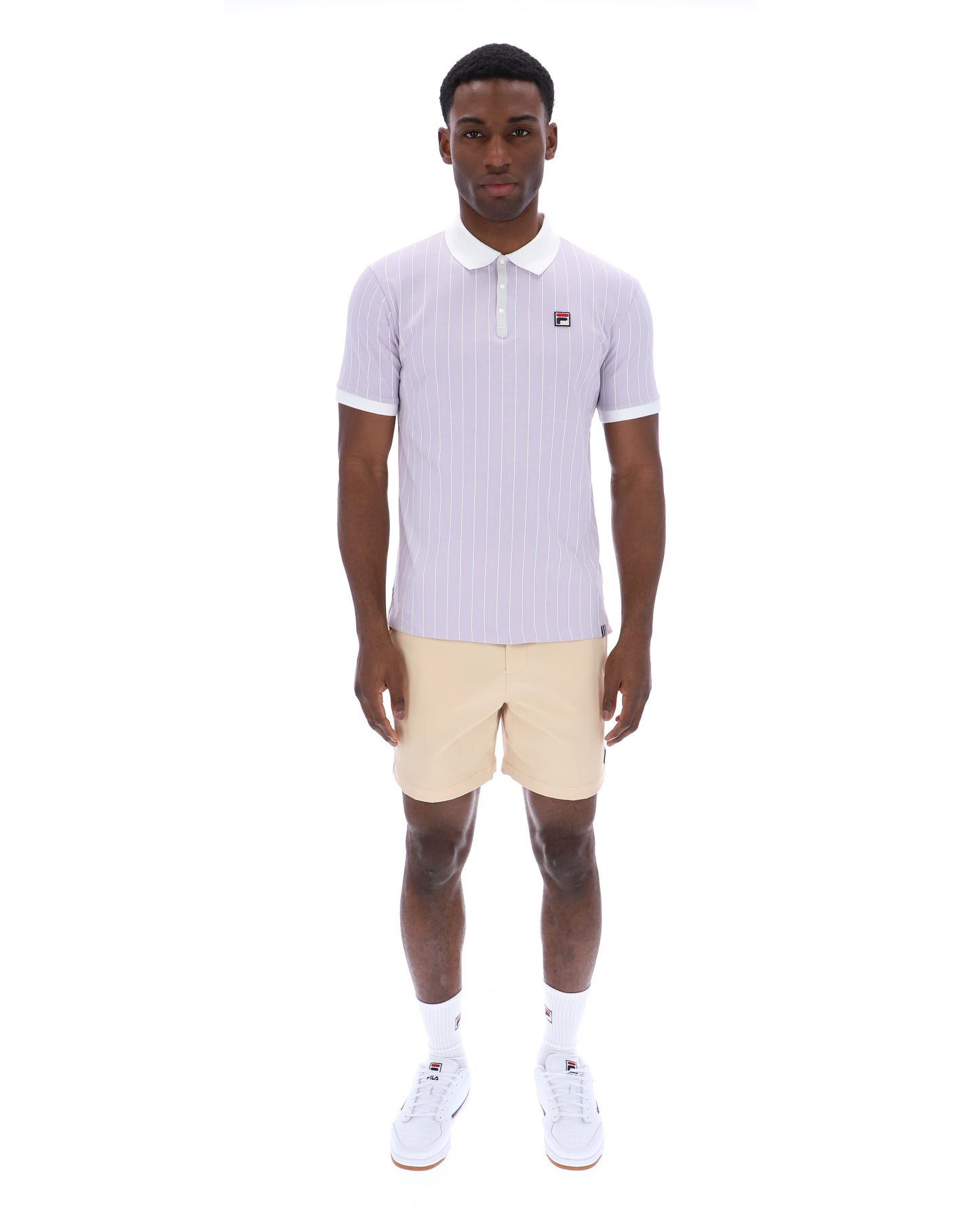 Fila vintage BB1 polo shirt in Misty Lilac, white, and dawn blue with a classic collar and short sleeves.