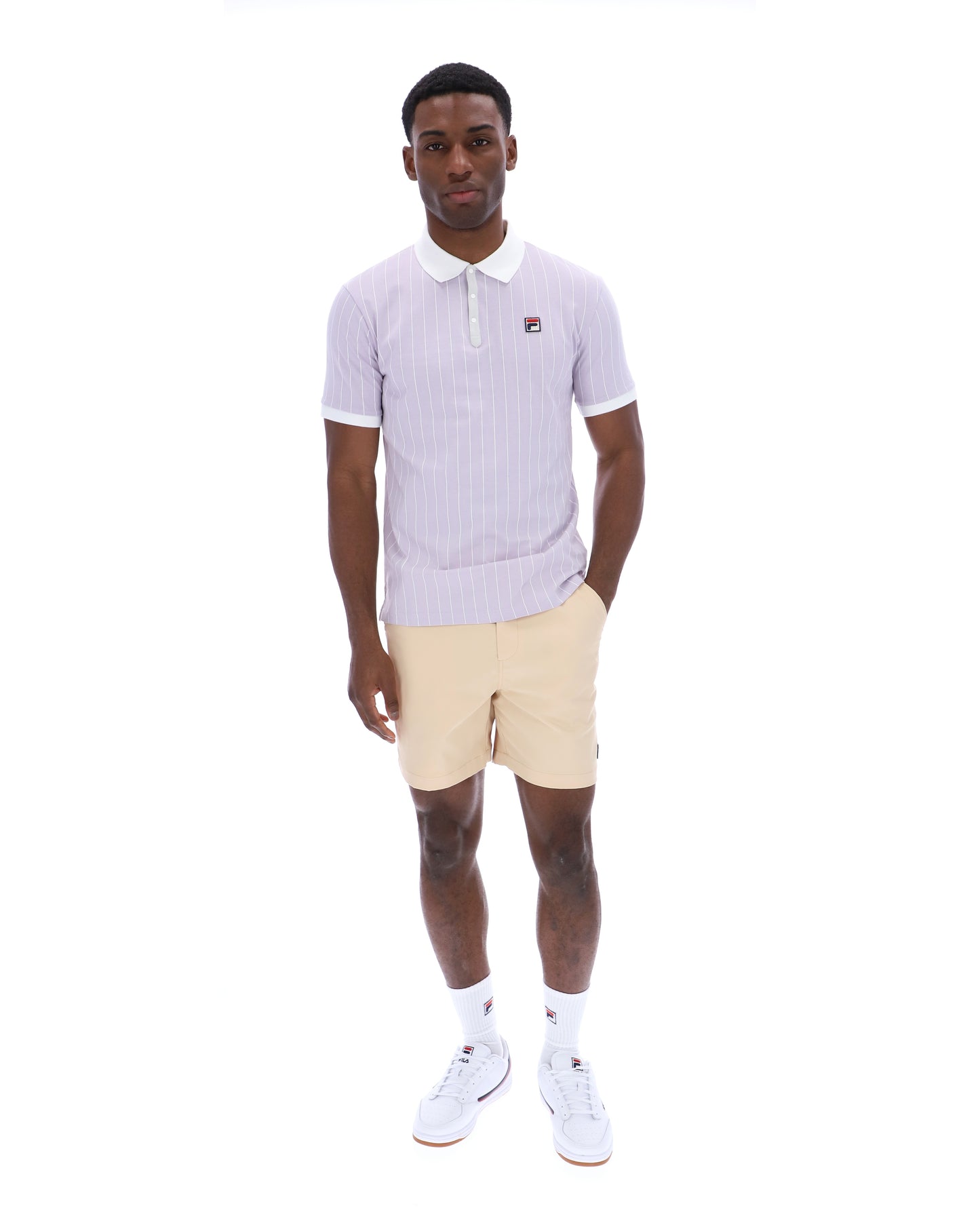 Fila Vintage BB1 polo shirt in misty lilac, white, and dawn blue, featuring a classic design and collar detail.