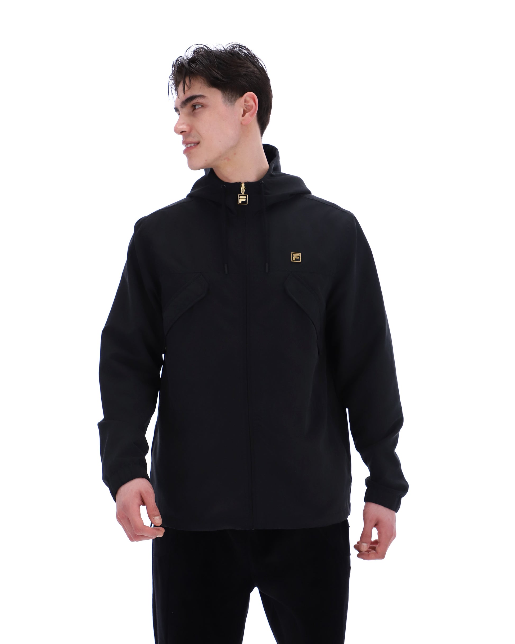 Black Fila lightweight jacket with a sleek design, featuring the Fila logo on the front, suitable for casual wear.