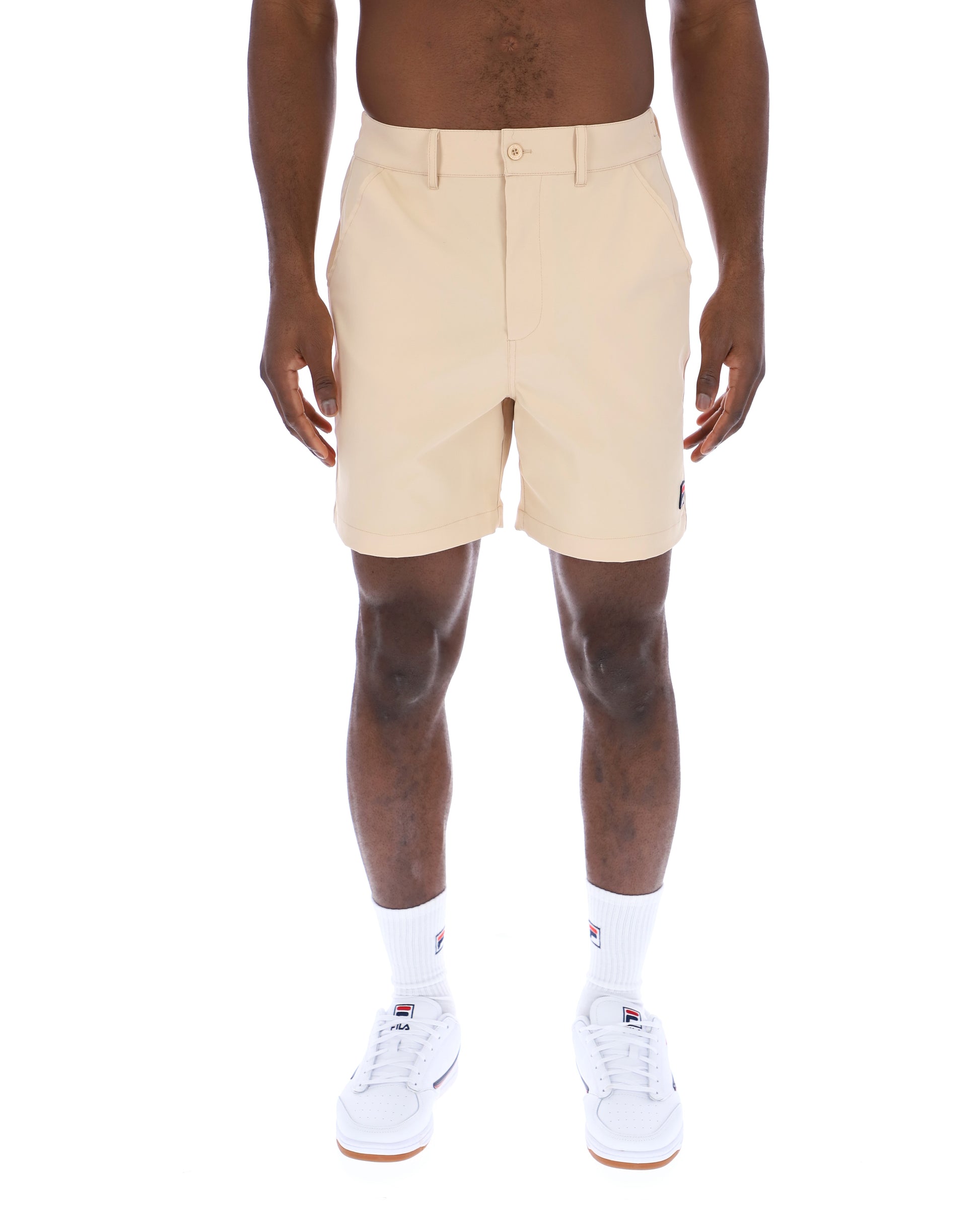 Beige Fila Caruso chino shorts with side pockets and a relaxed fit, displayed on a neutral background.