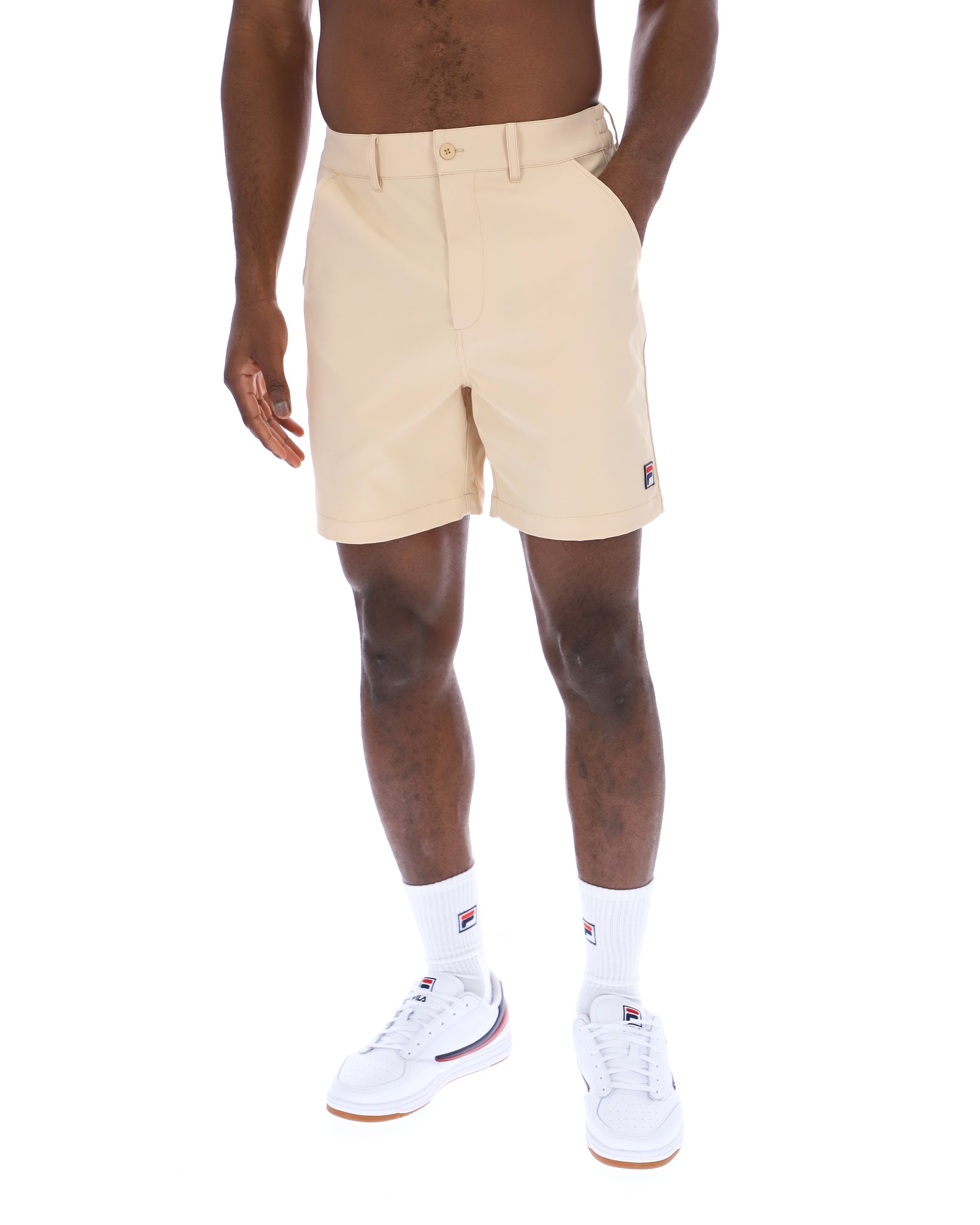 Beige Fila Caruso chino shorts with a relaxed fit, side pockets, and a branded waistband, perfect for casual summer wear.