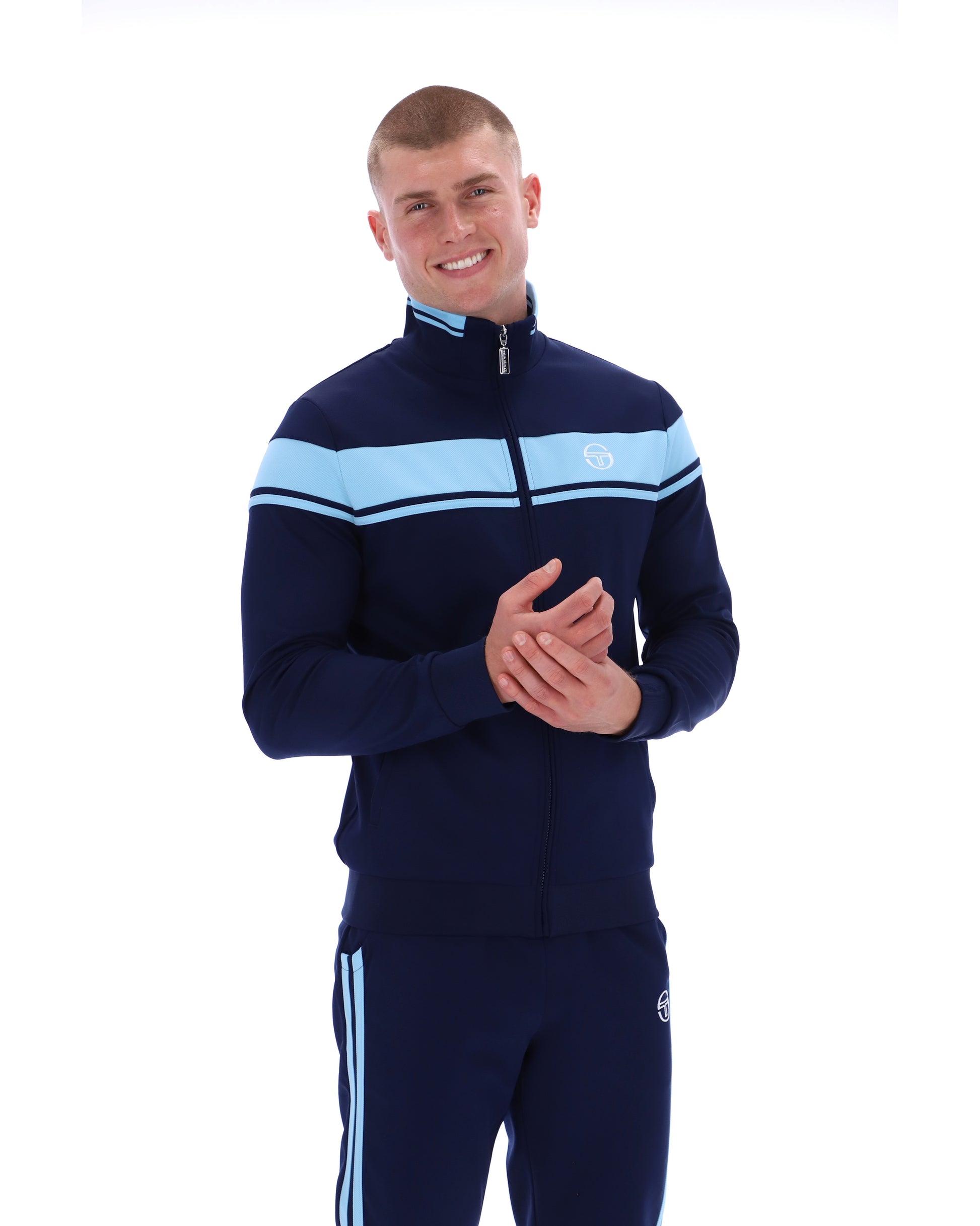 Navy and Baltic Sea Sergio Tacchini Damarindo track top with zip-up front and ribbed cuffs, casual athletic style.