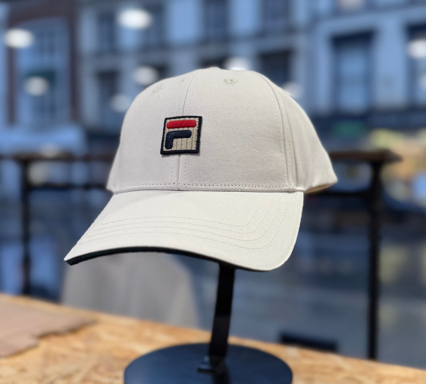 Fila Tantam Classic 6-panel fasten cap in Mediterrane and Gardenia colors, featuring a sporty design and adjustable strap.