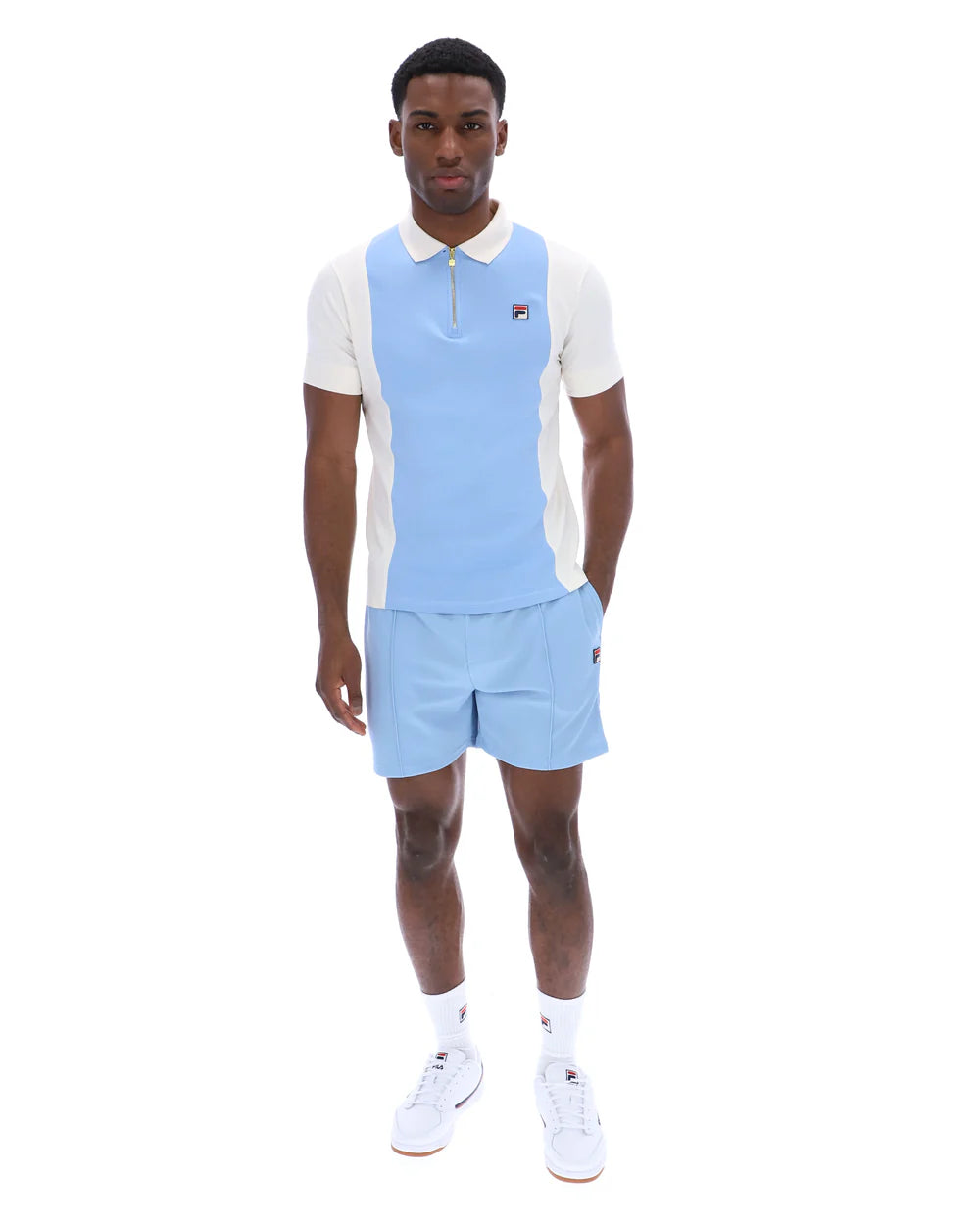 Fila Vintage Pierro Cut and Sew Zip Polo shirt in Gardenia and Frozen Fjord, featuring a classic collar and zipper detail.