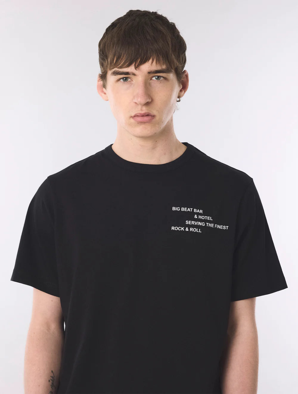 Black Pretty Green Big Beat Hotel T-Shirt featuring a casual fit and graphic design on the front.