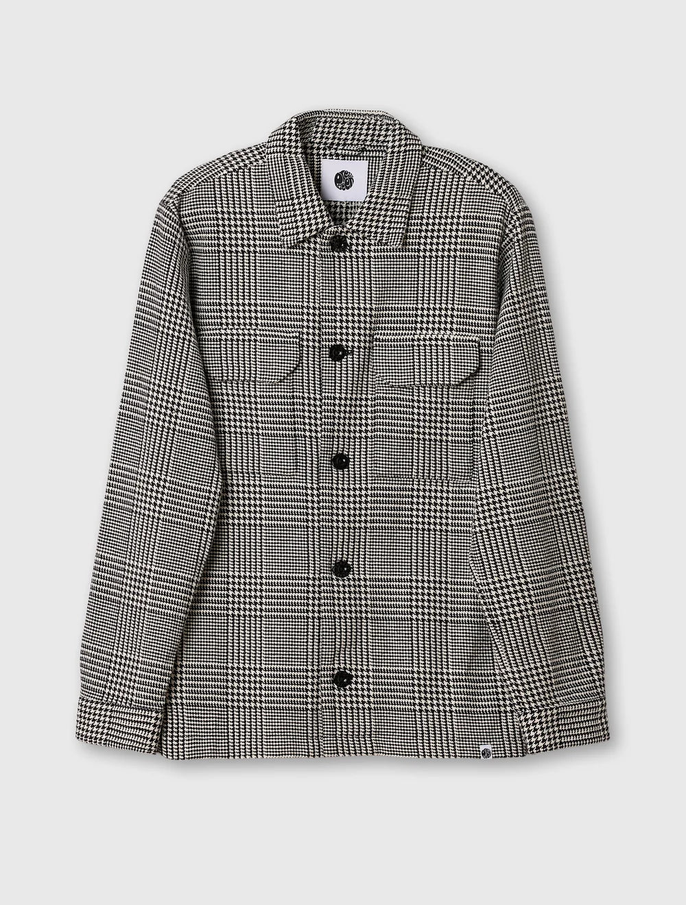 Black Pretty Green Alderley Prince of Wales jacket with tailored fit and classic design, shown on a hanger.