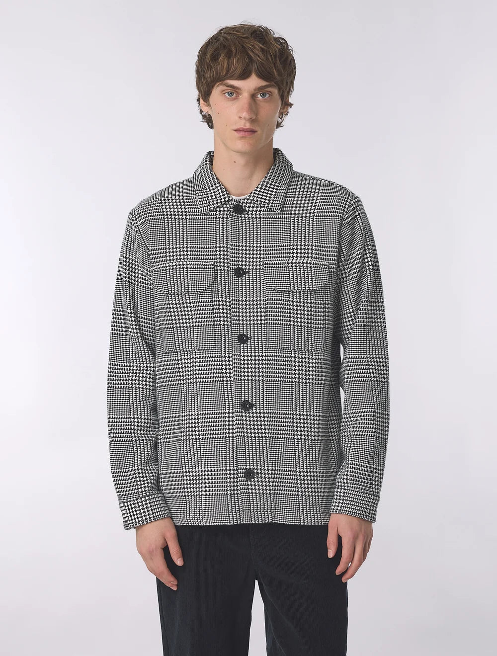 Black Pretty Green Alderley Prince of Wales jacket displayed on a mannequin, showcasing tailored collar and classic design.