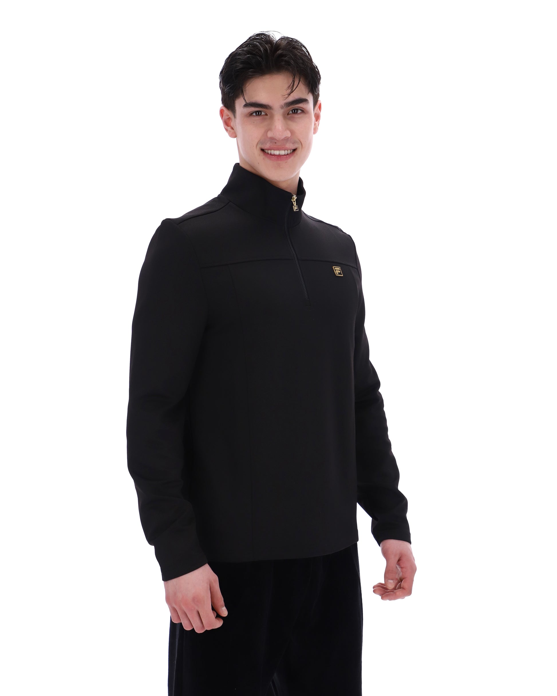 Black Fila Hogan quarter zip jumper with a high collar and subtle branding, shown on a mannequin.