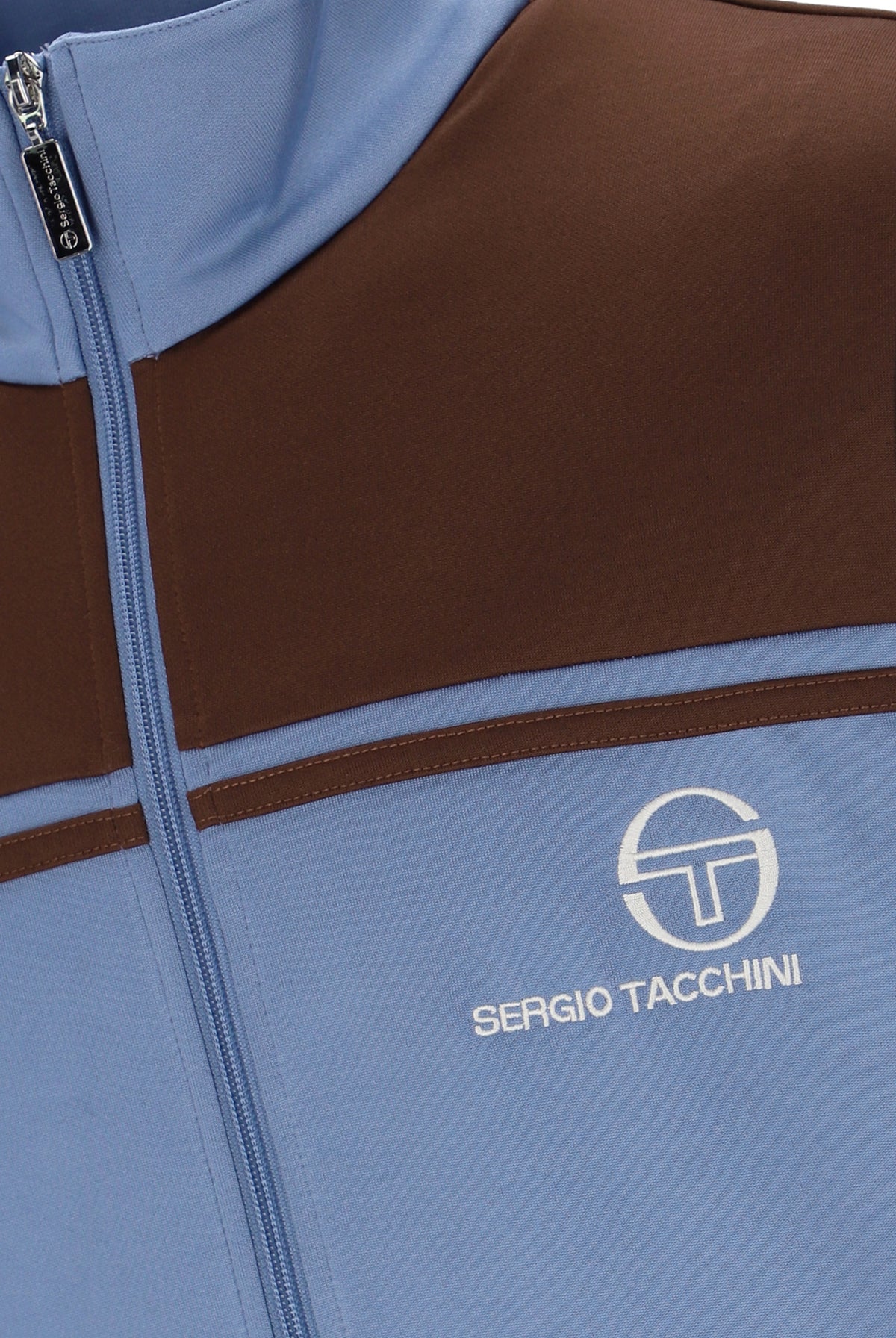 Sergio Tacchini New Young Line track top in country blue and potting soil with sporty design and zip-up front.