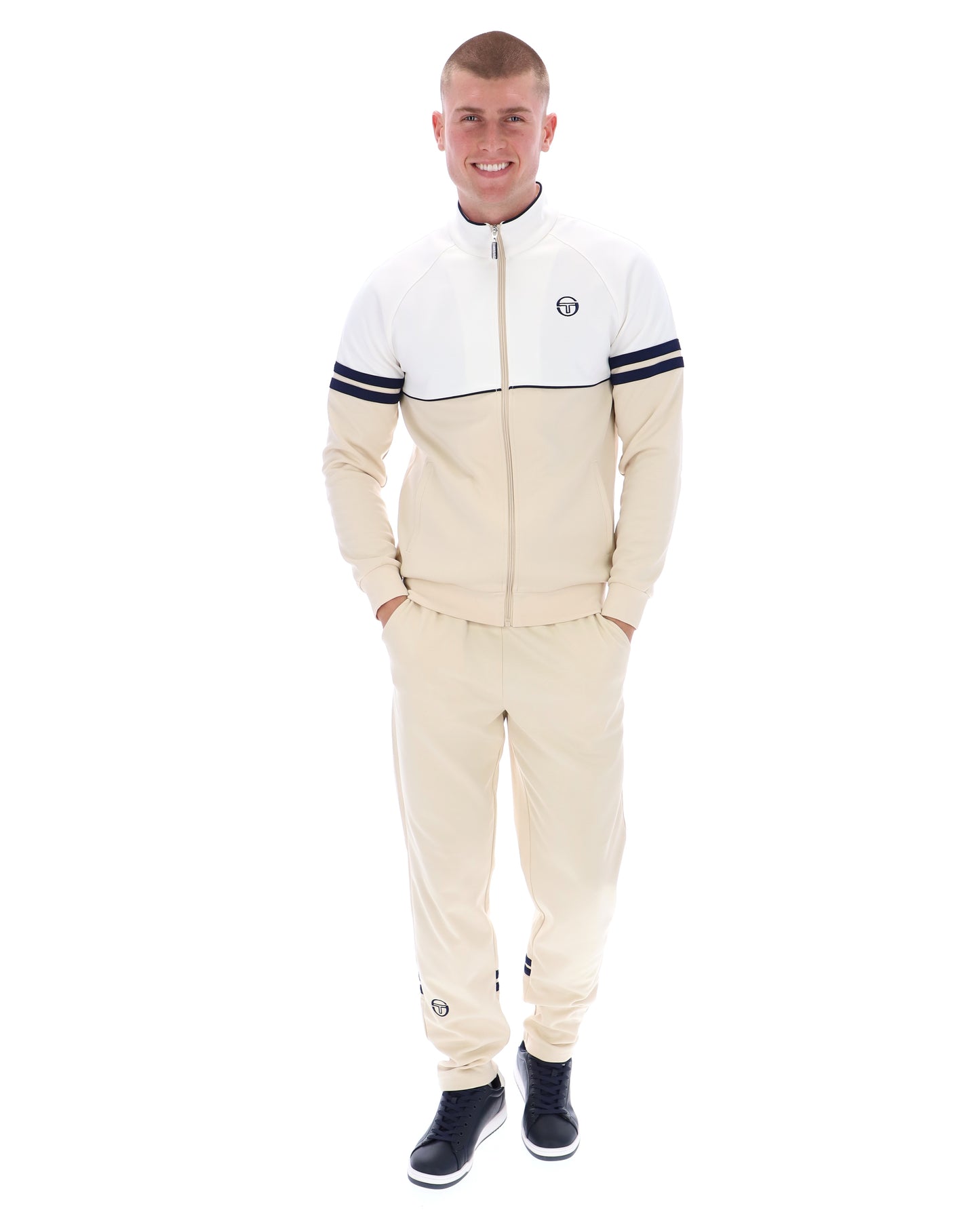 Sergio Tacchini Orion track top in gardenia, sandshell, and maritime blue with color-block design and zip front.
