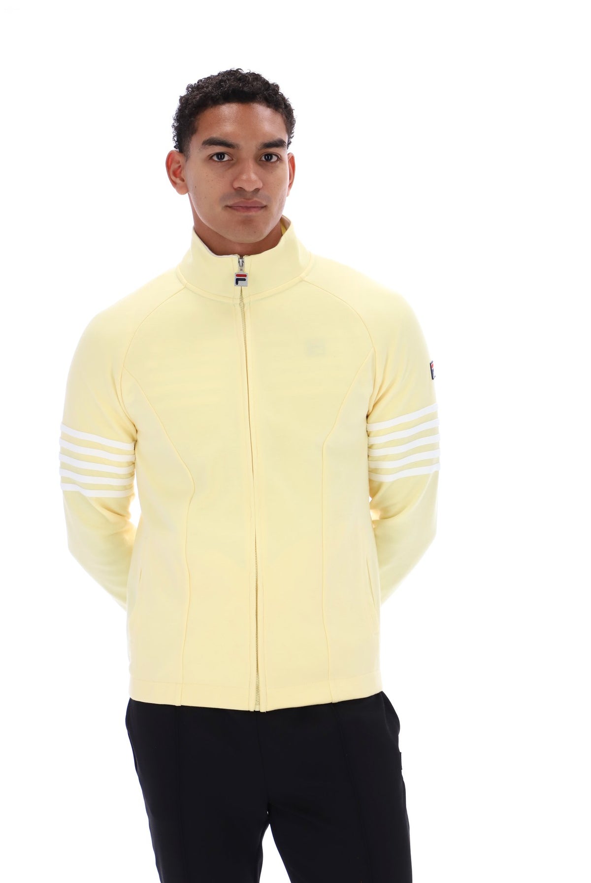 Fila Vintage Patrice 5 Stripe Track Top in double cream and white, featuring a classic cut and sewn design with bold stripe details.