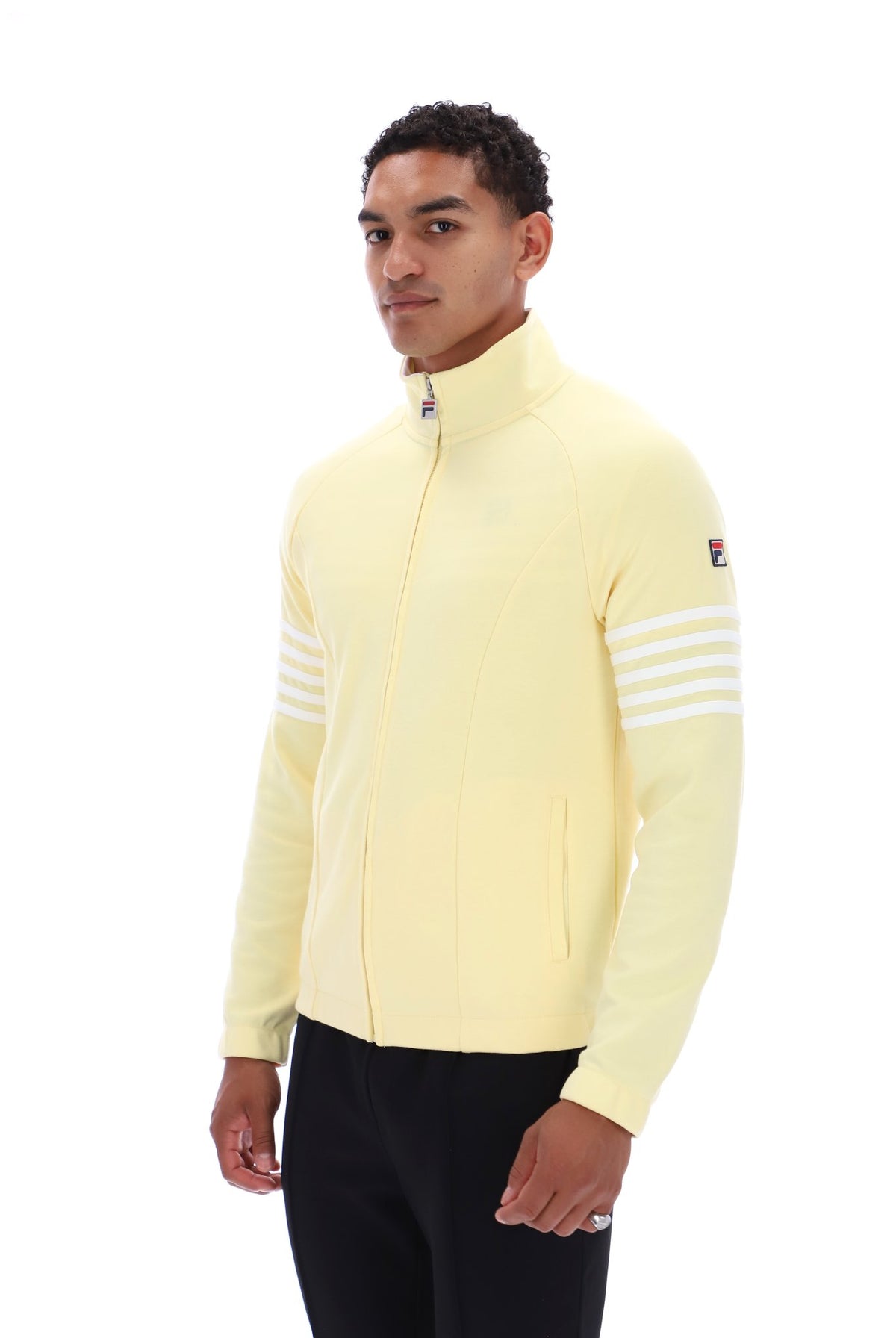 Fila Vintage Patrice 5 Stripe Track Top in double cream and white, featuring classic color blocking and a sporty design.