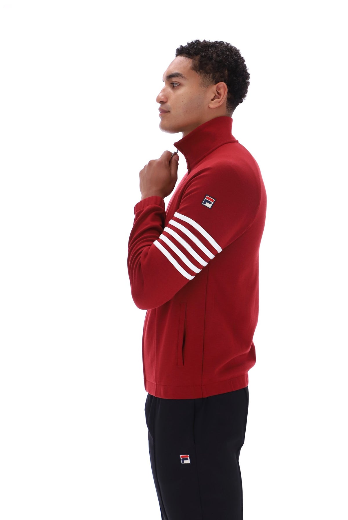 Fila Vintage Patrice cut and sew 5 stripe track top in deep red and white, featuring classic sporty design and bold color blocking.