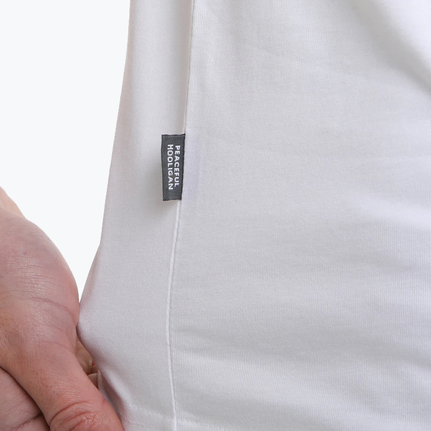White Peaceful Hooligan Trainspotters T-Shirt featuring a trainspotting graphic on the front, casual and comfortable fit.