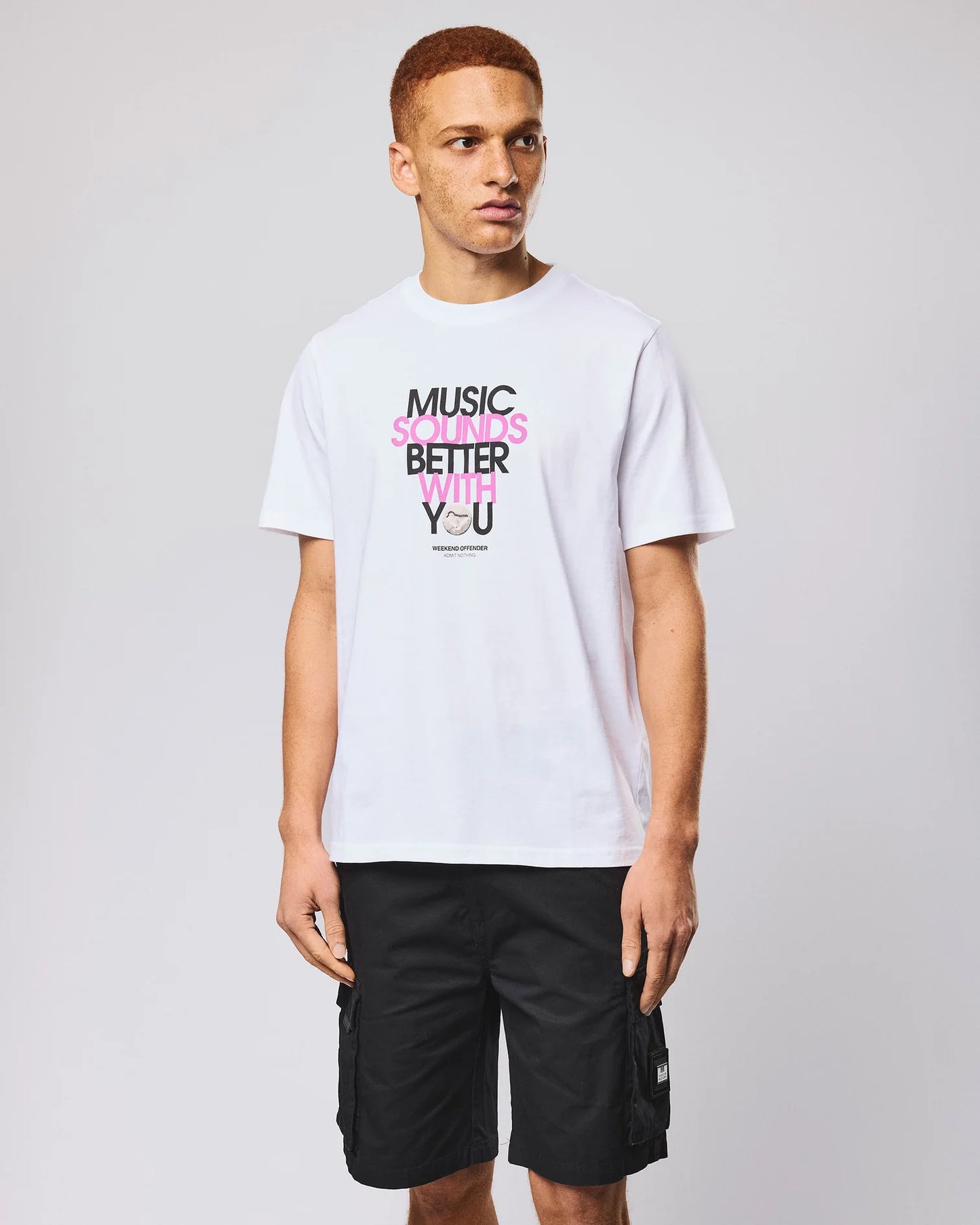 Weekend Offender Bangalter graphic white T-shirt showing bold print and casual fit on model.