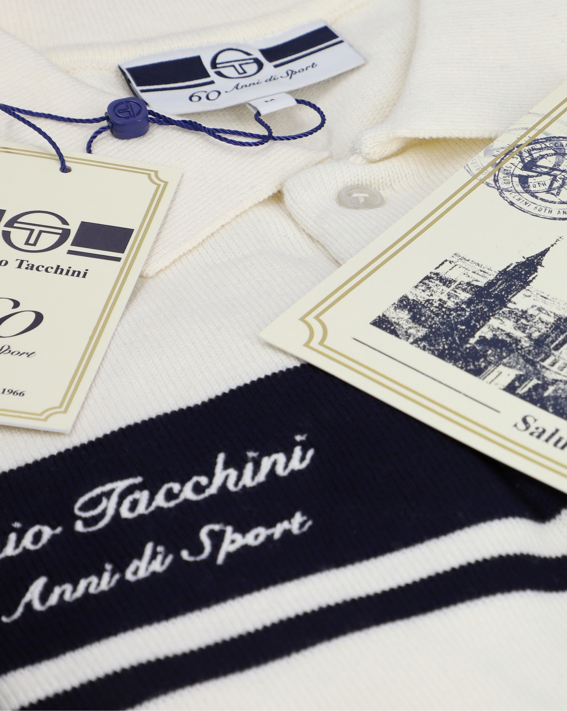 Sergio Tacchini 60th Anniversary Youngline Polo shirt in Gardenia and Maritime Blue, displayed in a gift box.