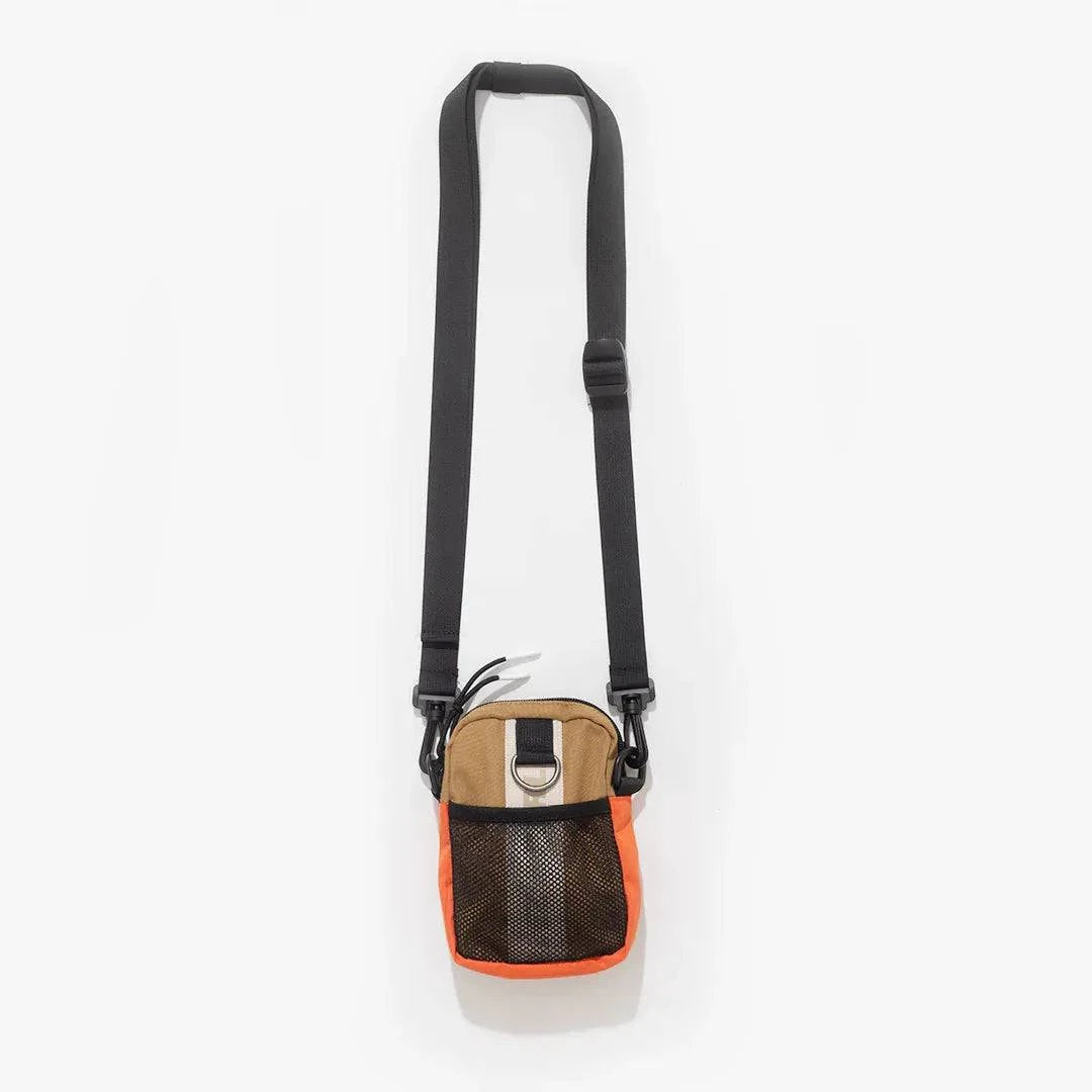 Parlez Asilli pouch bag in tan brown with adjustable strap, casual accessory for everyday wear, featuring a compact design.