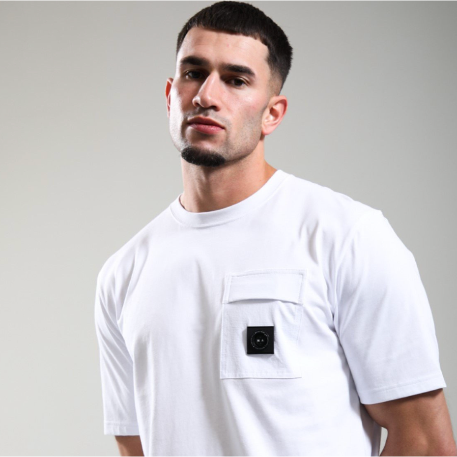 White Marshall Artist Kyoto Pocket T-Shirt with front pocket, casual fit, soft cotton fabric, styled on a model.