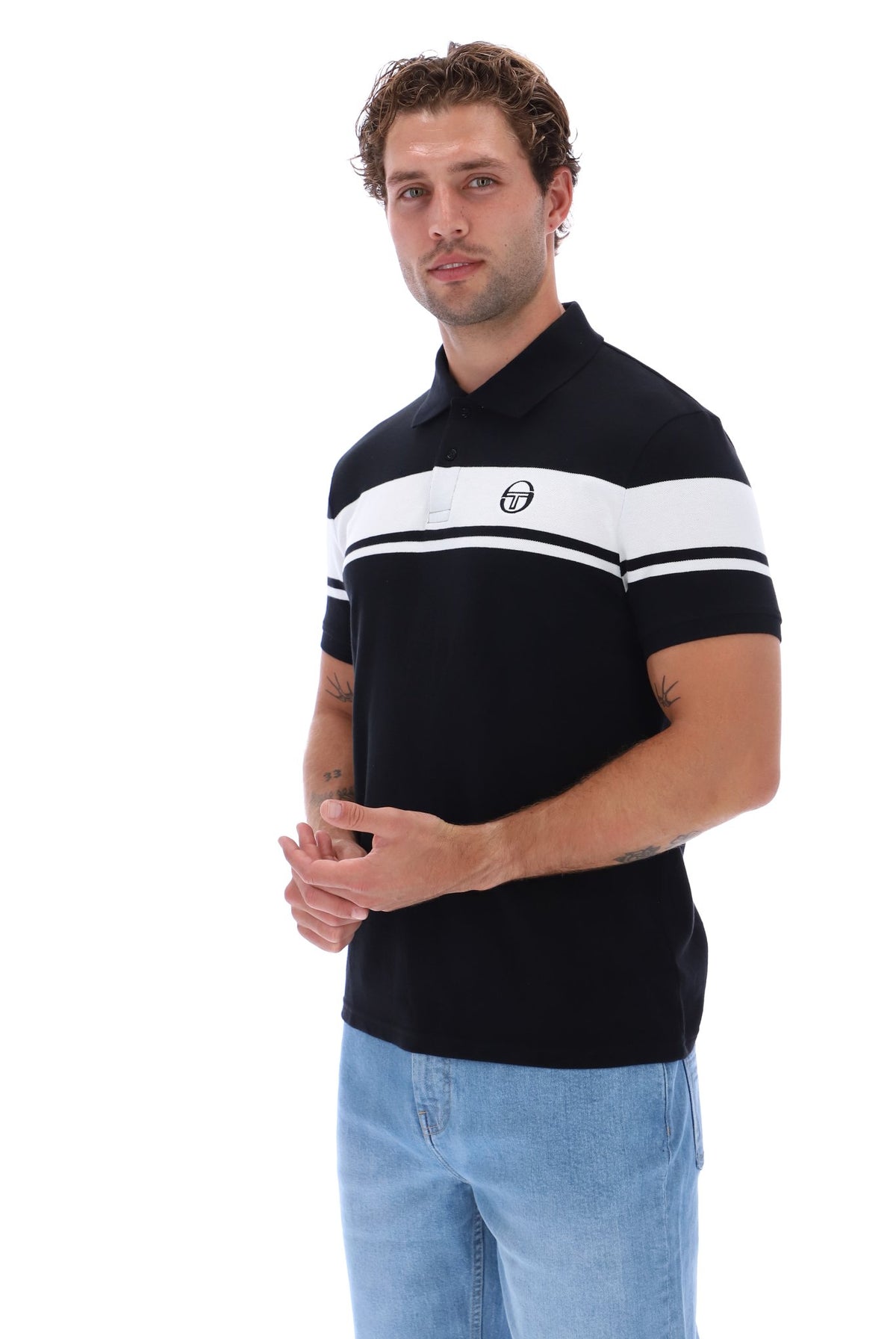 Black and white Sergio Tacchini Young Line polo shirt with classic collar and short sleeves, displayed flat.