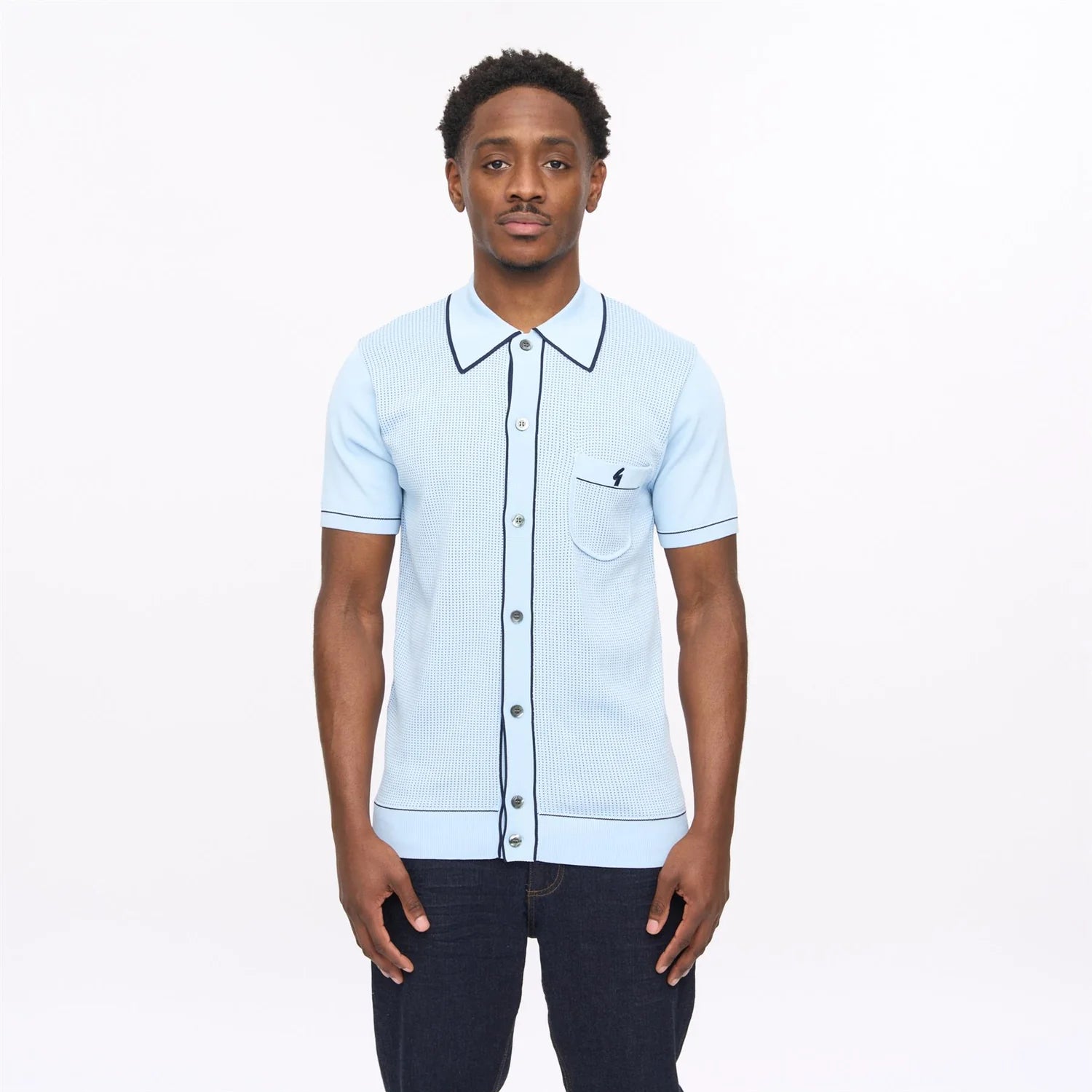 Gabicci Vintage Gabicci Di Lello knitted polo shirt with surf-inspired design, featuring a classic collar and textured knit fabric.