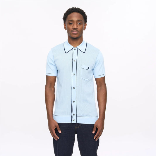 Gabicci Vintage Gabicci Di Lello knitted polo shirt with surf-inspired design, featuring a classic collar and textured knit fabric.