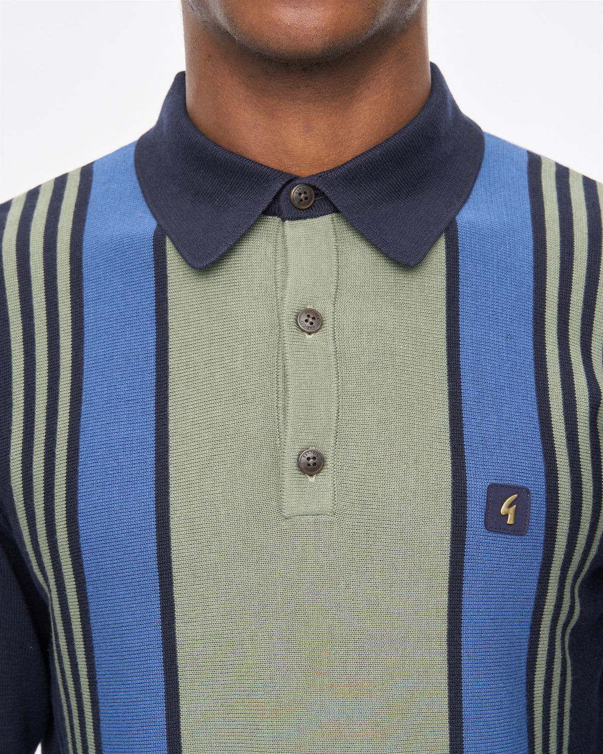 Gabicci Vintage Searle Stripe Navy knitted polo shirt, close-up showing navy and white striped pattern and collar detail.