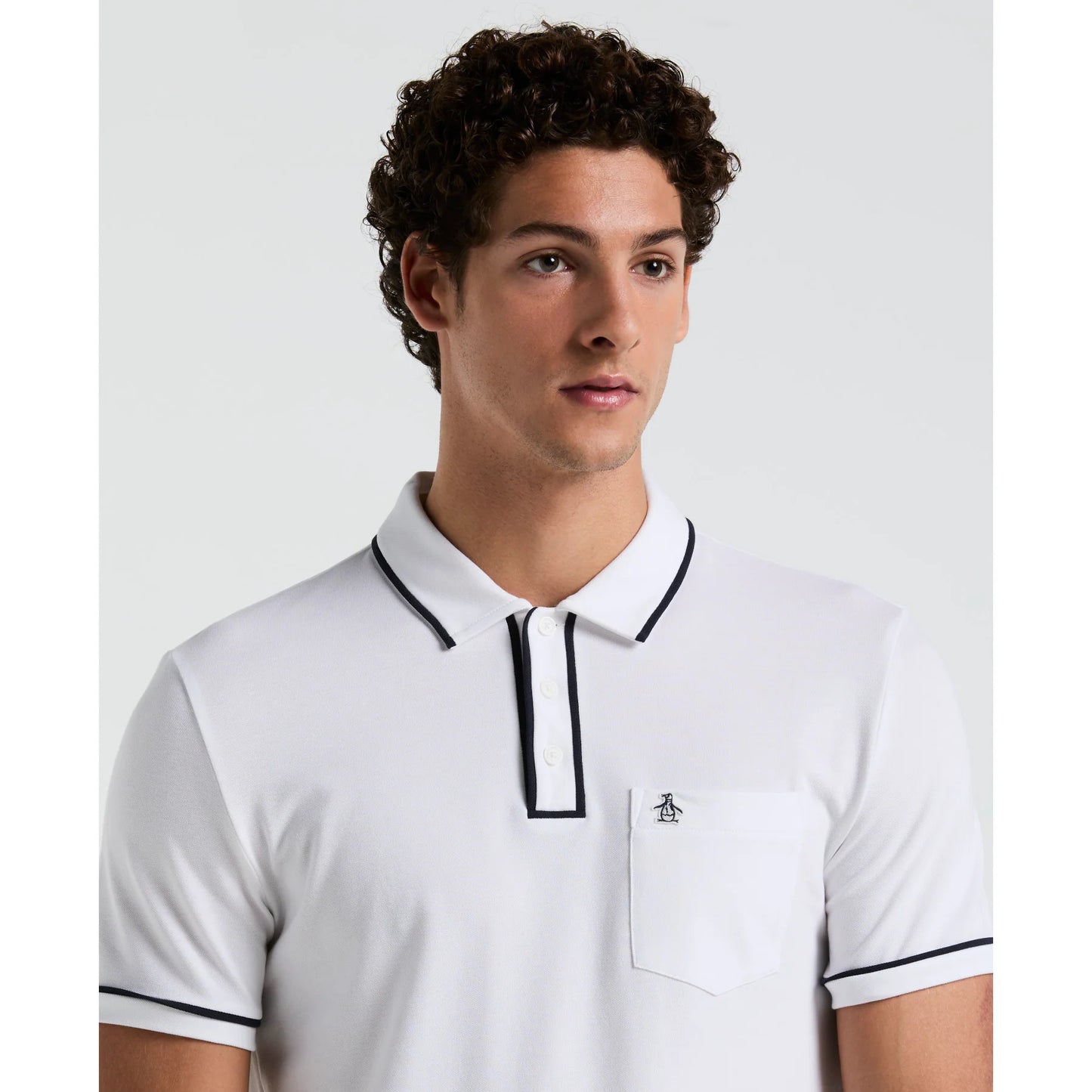 Original Penguin Earl Pique Polo Shirt in bright white, showcasing a classic fit and textured polo fabric on a clean background.