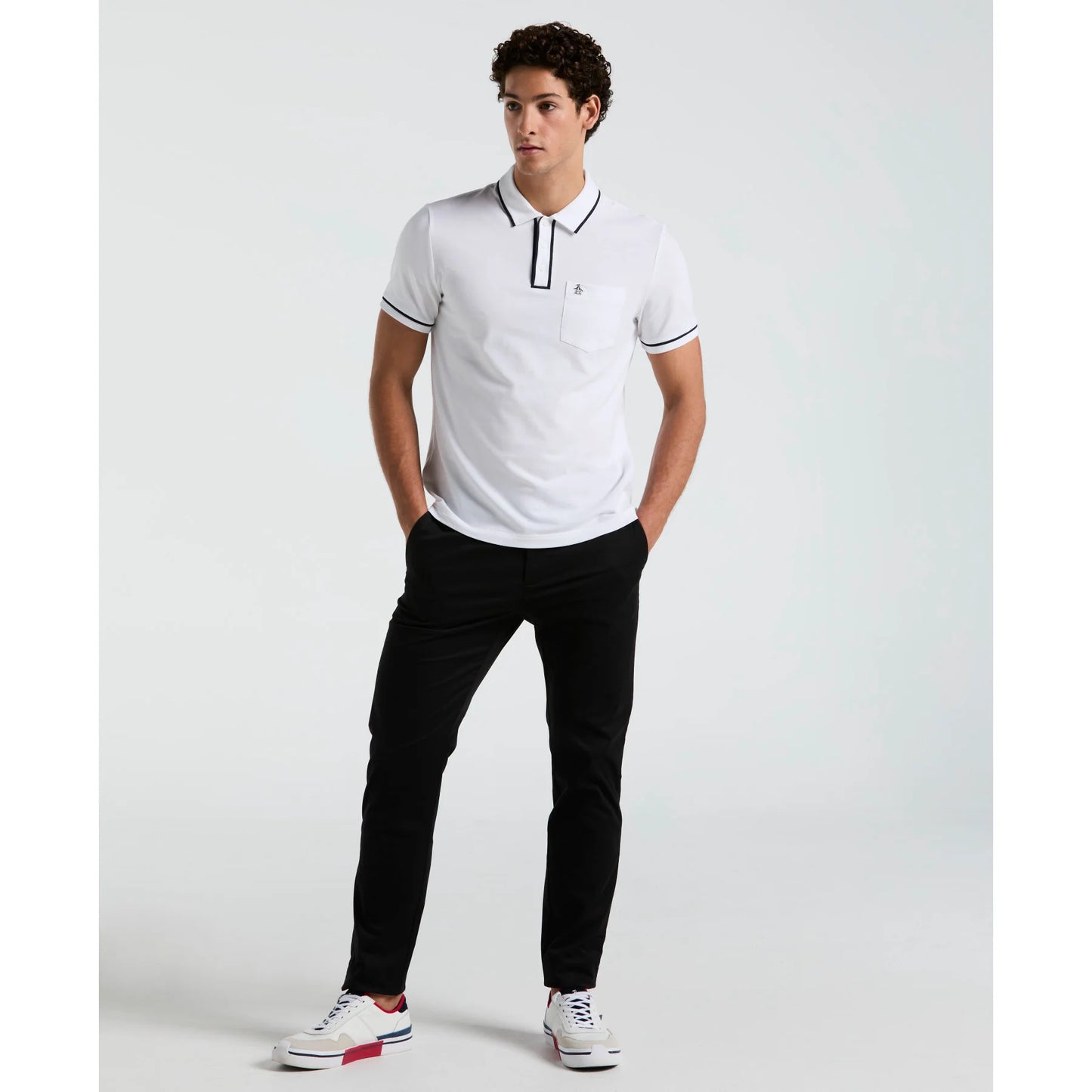 Original Penguin Earl Pique Polo Shirt in bright white, featuring a classic collar and short sleeves, laid flat.