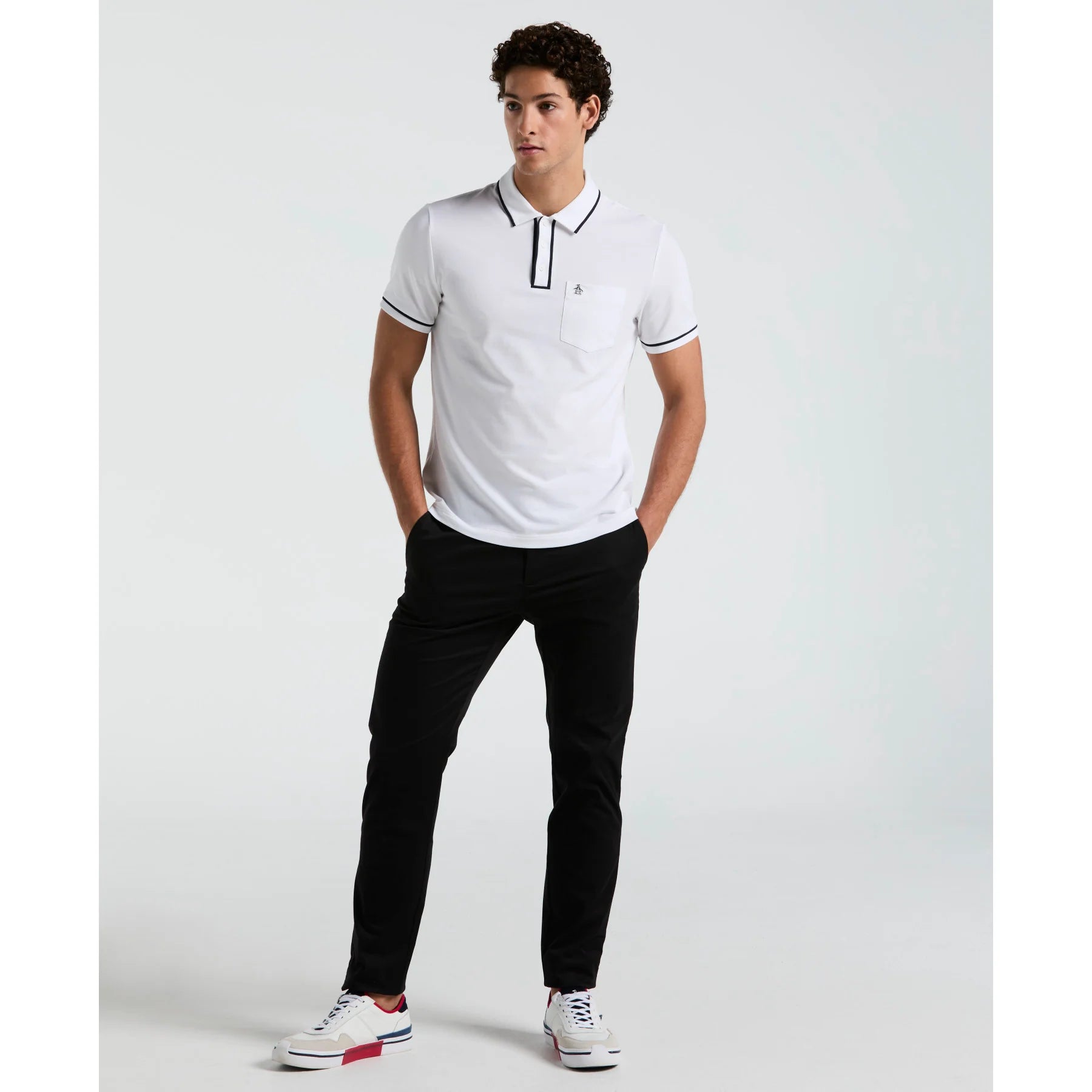 Original Penguin Earl Pique Polo Shirt in bright white, featuring a classic collar and short sleeves, laid flat.