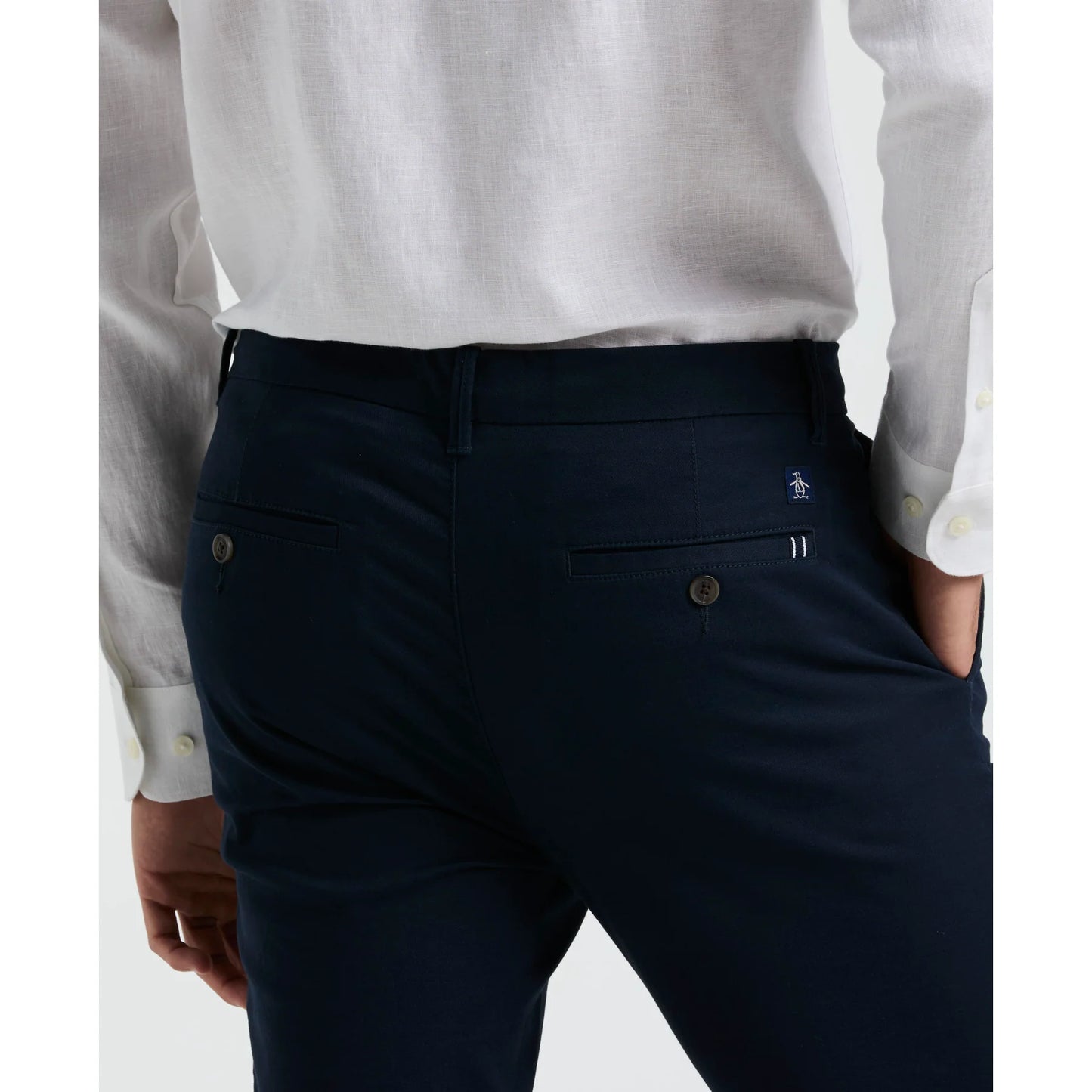 Original Penguin slim fit chinos in dark sapphire, men's trousers with a tailored fit, showcasing front and side view on a white background.