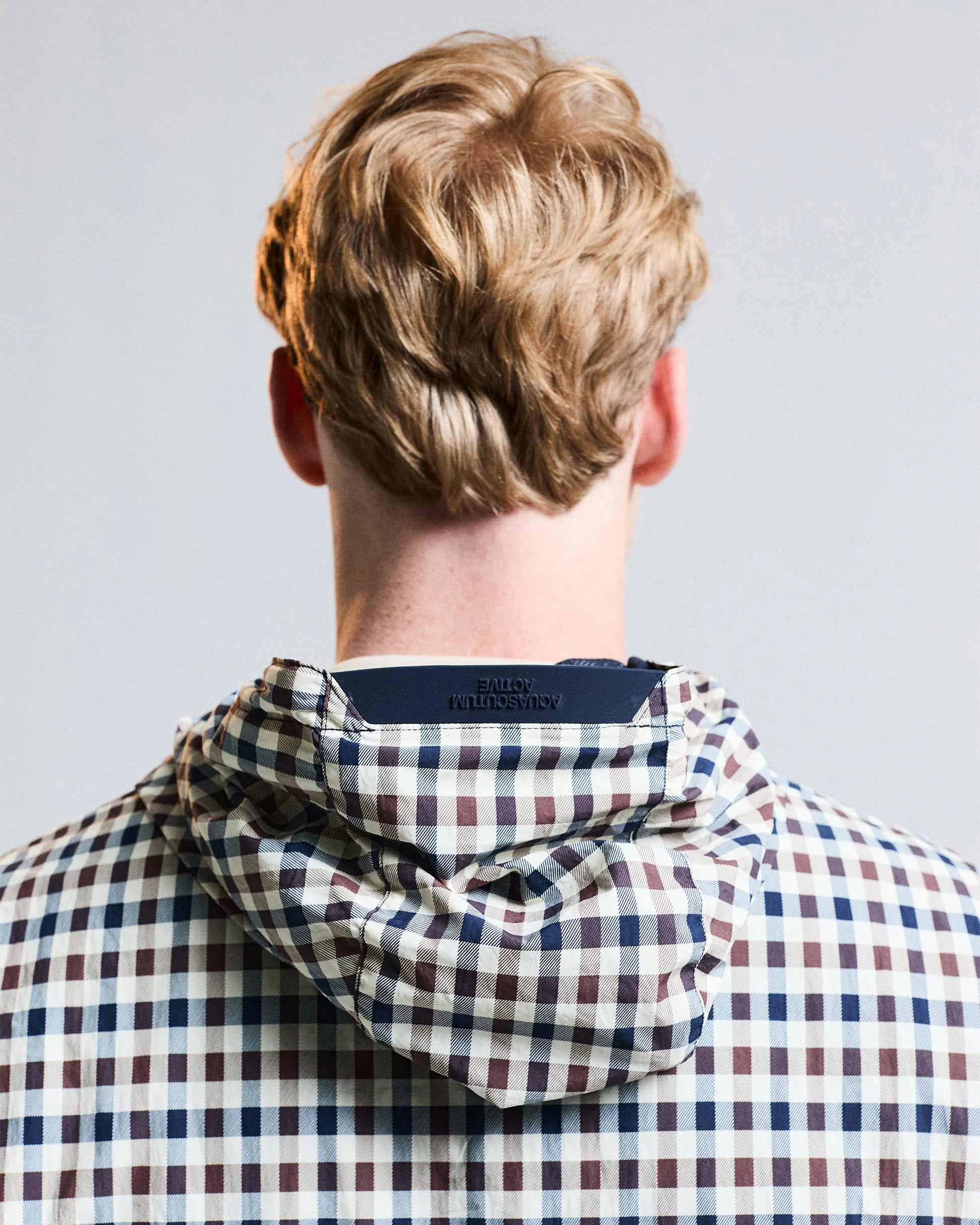 Aquascutum Lamina hooded jacket with classic club check pattern, featuring a stylish hood and tailored fit.
