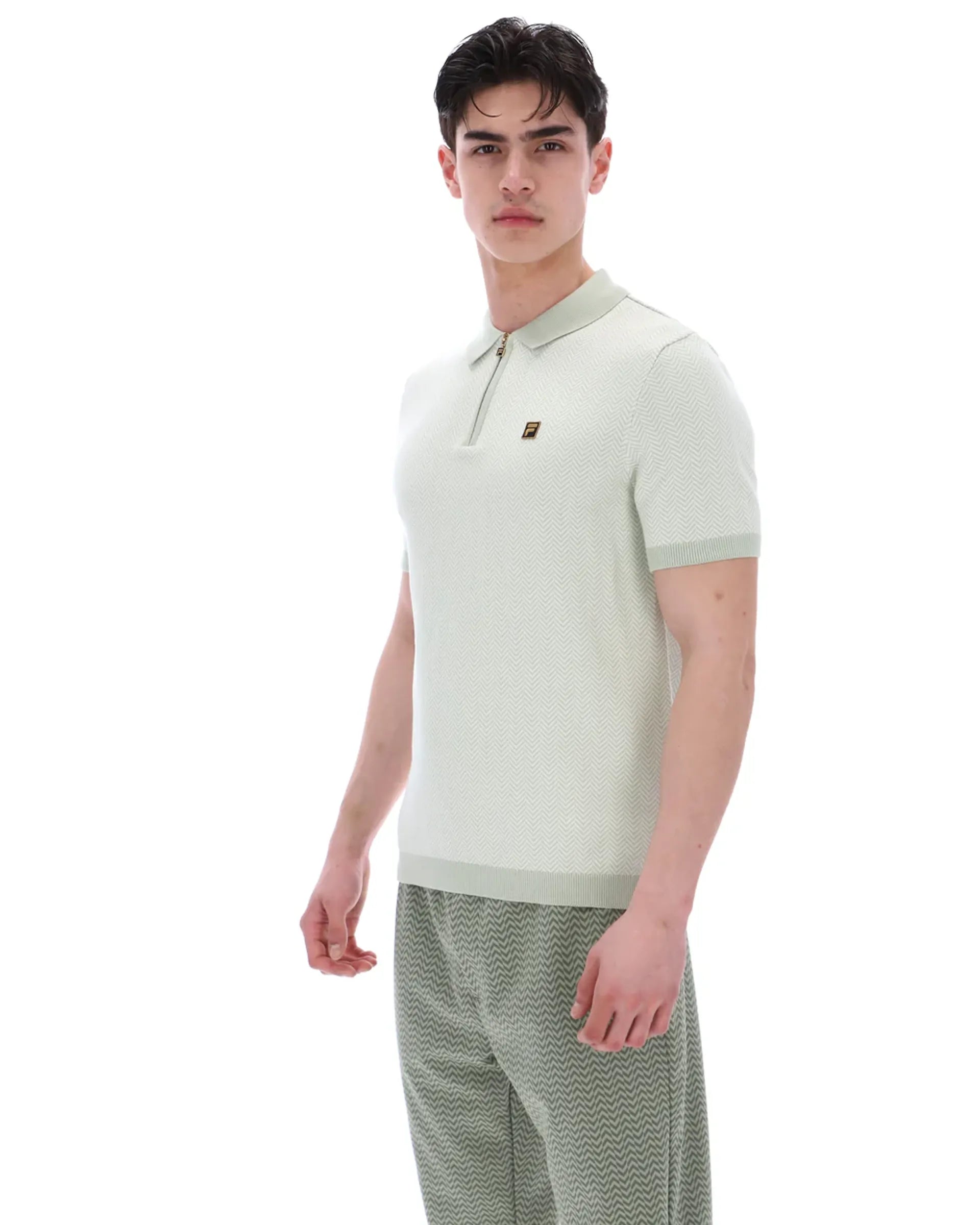 Fila Gold Marty Zip Polo Shirt in sea foam color, featuring a classic knit design and a front zip closure.