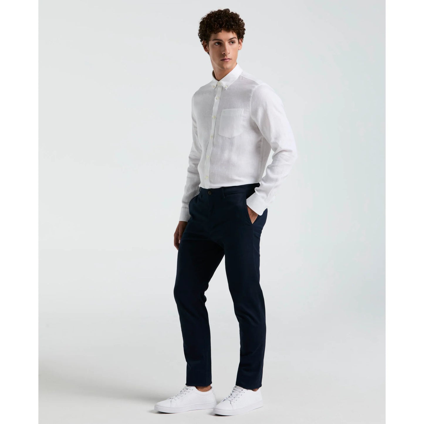 Original Penguin slim fit chinos in dark sapphire, casual trousers with a modern fit and clean design, front view.
